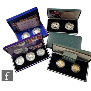Two Elizabeth II Royal Mint Millennium 2000 silver proof com...