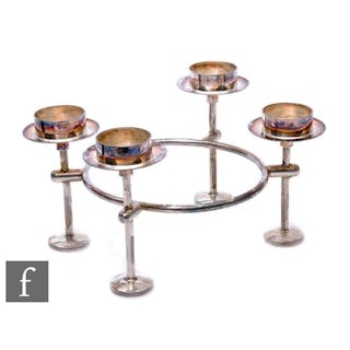 A hallmarked silver four light circular candle table decorat...
