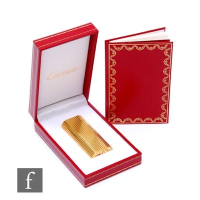 A Must De Cartier gold plated Briquet lighter, height 6cm, c...