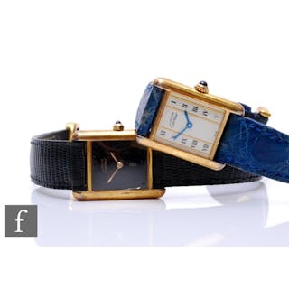 Two lady's Cartier De Must silver gilt Vermeil wrist watches...