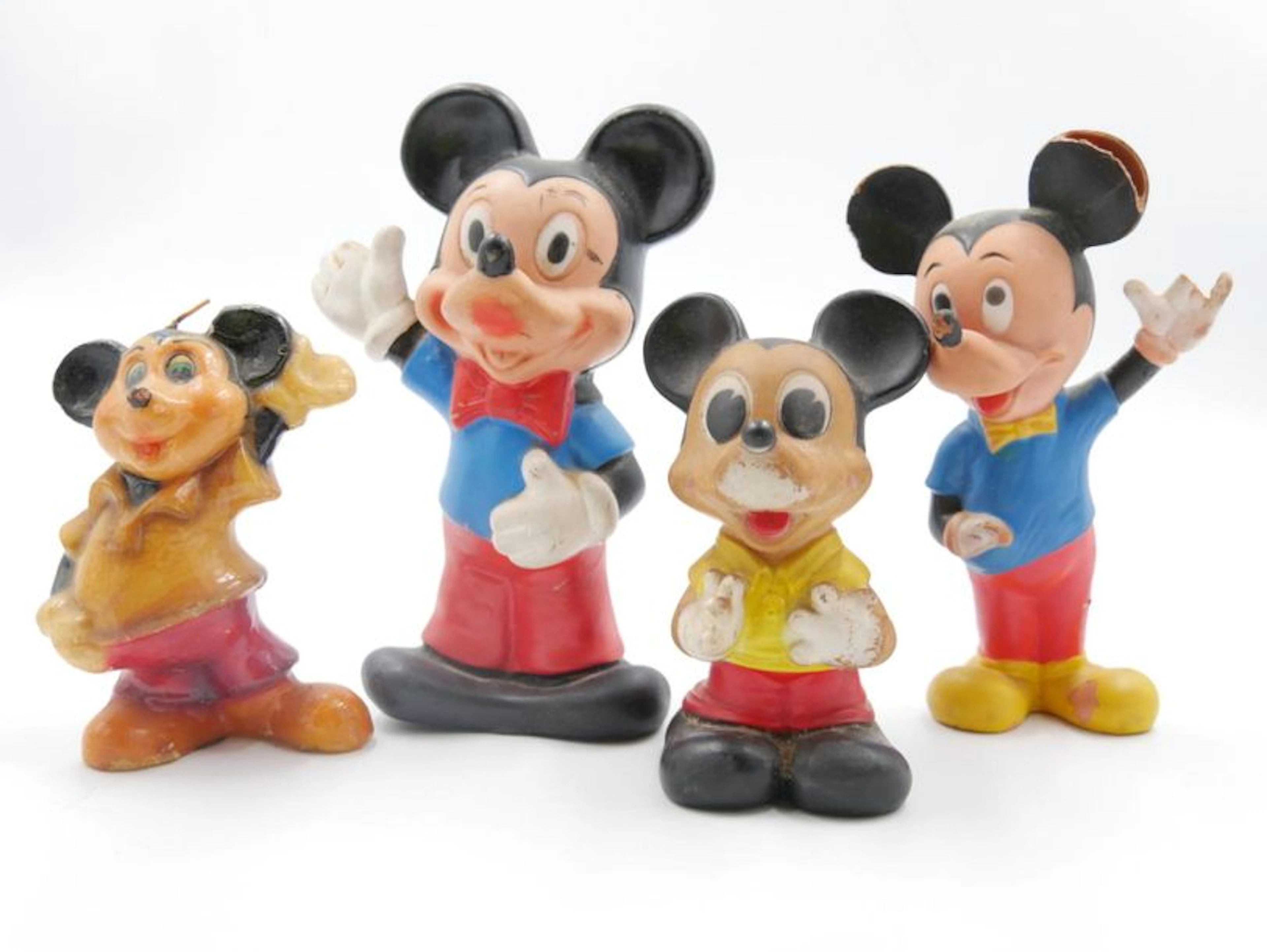 DISNEY, Trois jouets pouets Mickey en plastique…