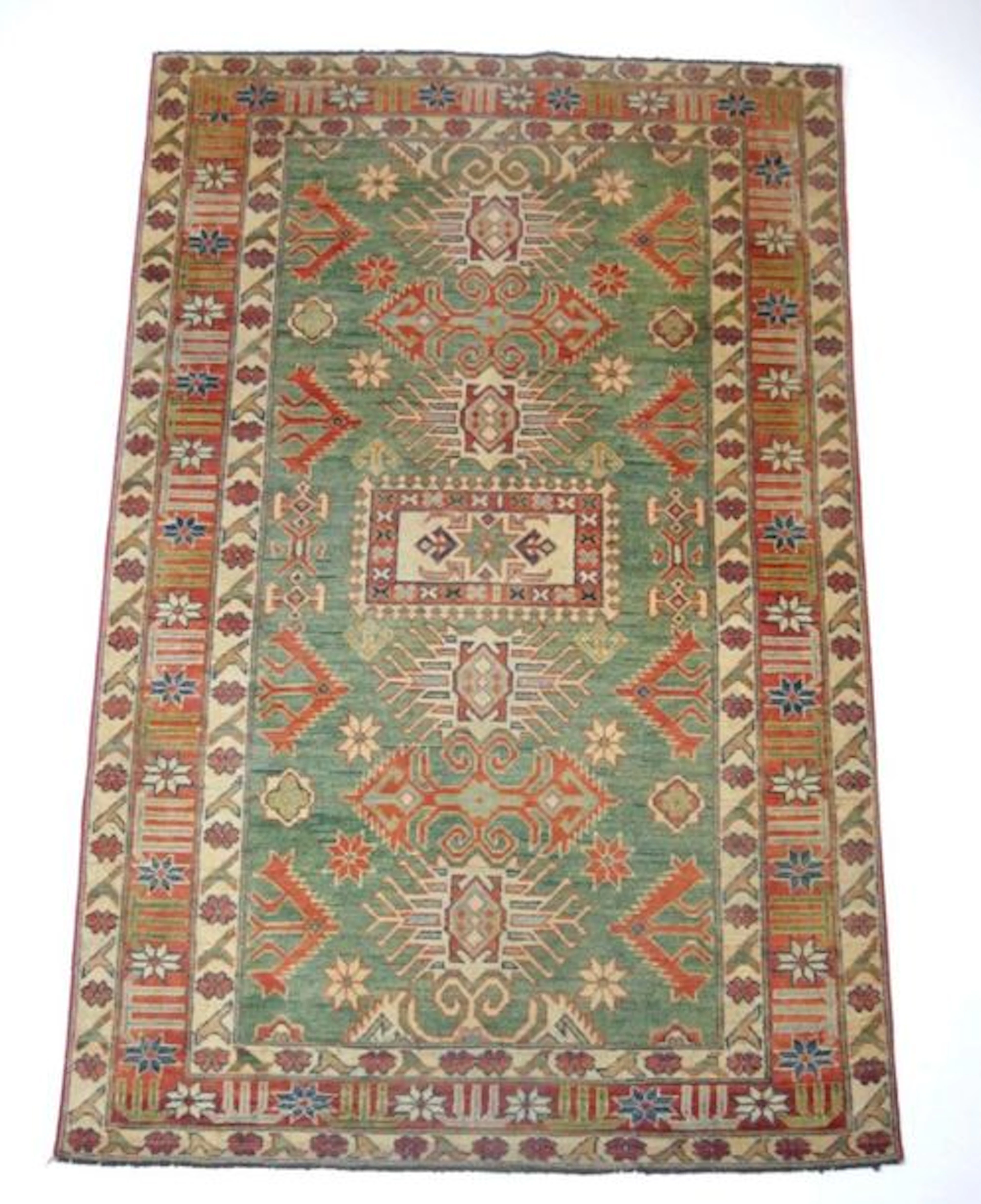 Tapis point noué en laine à décor du Caucase…