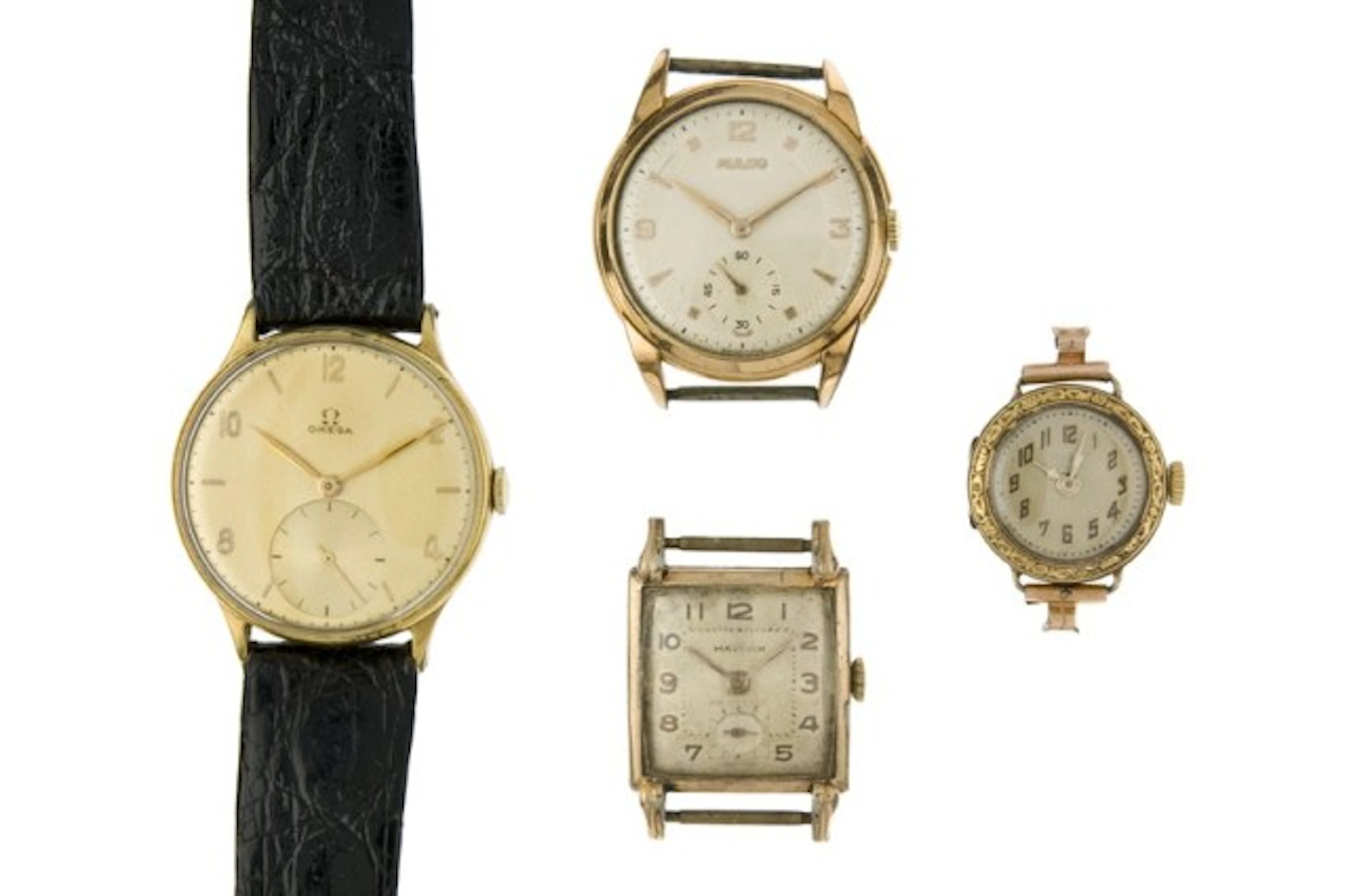 LOT DE QUATRE MONTRES Un lot de quatre montres bracelets en métal