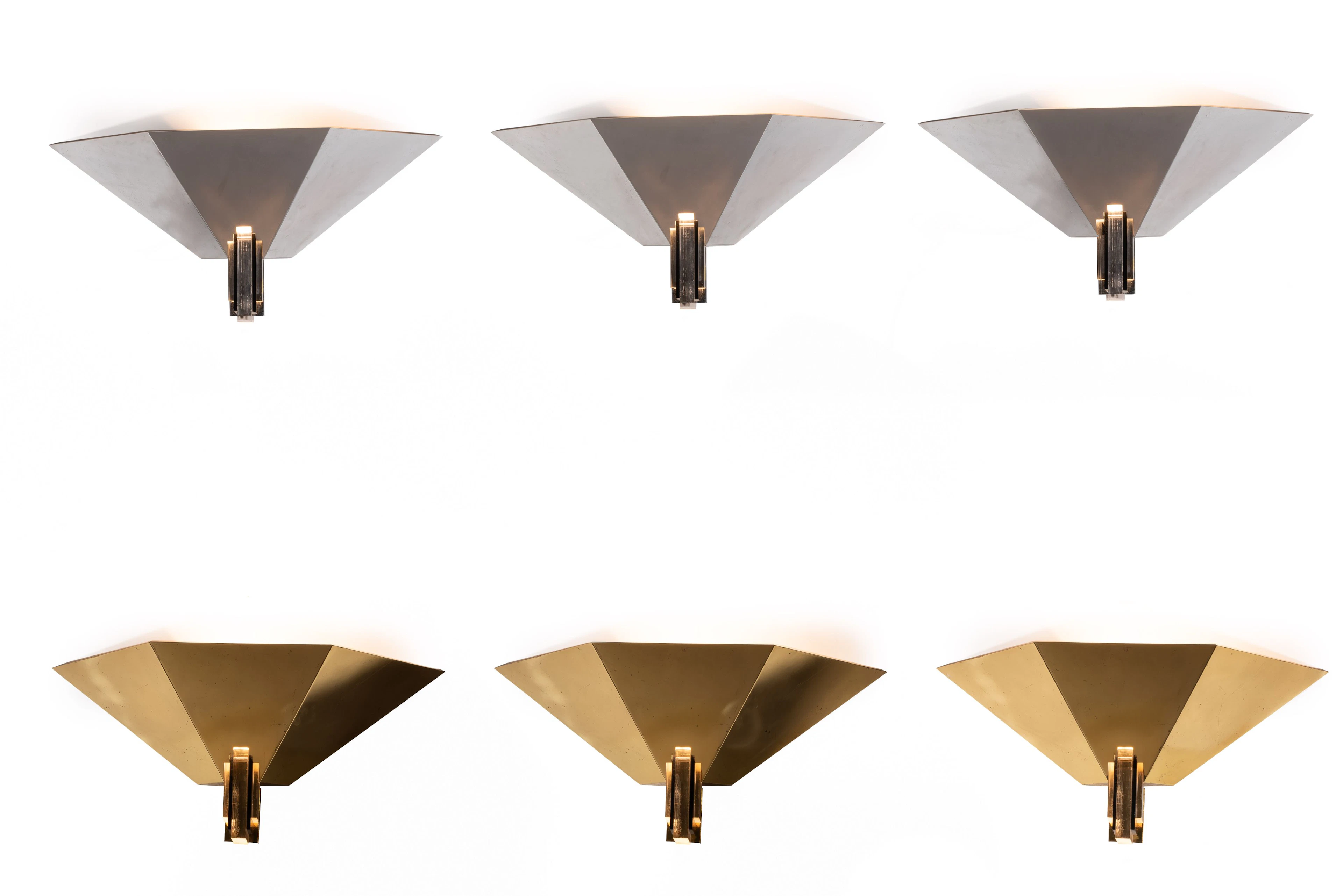 SUITE DE QUATRE APPLIQUES DE STYLE ART DECO