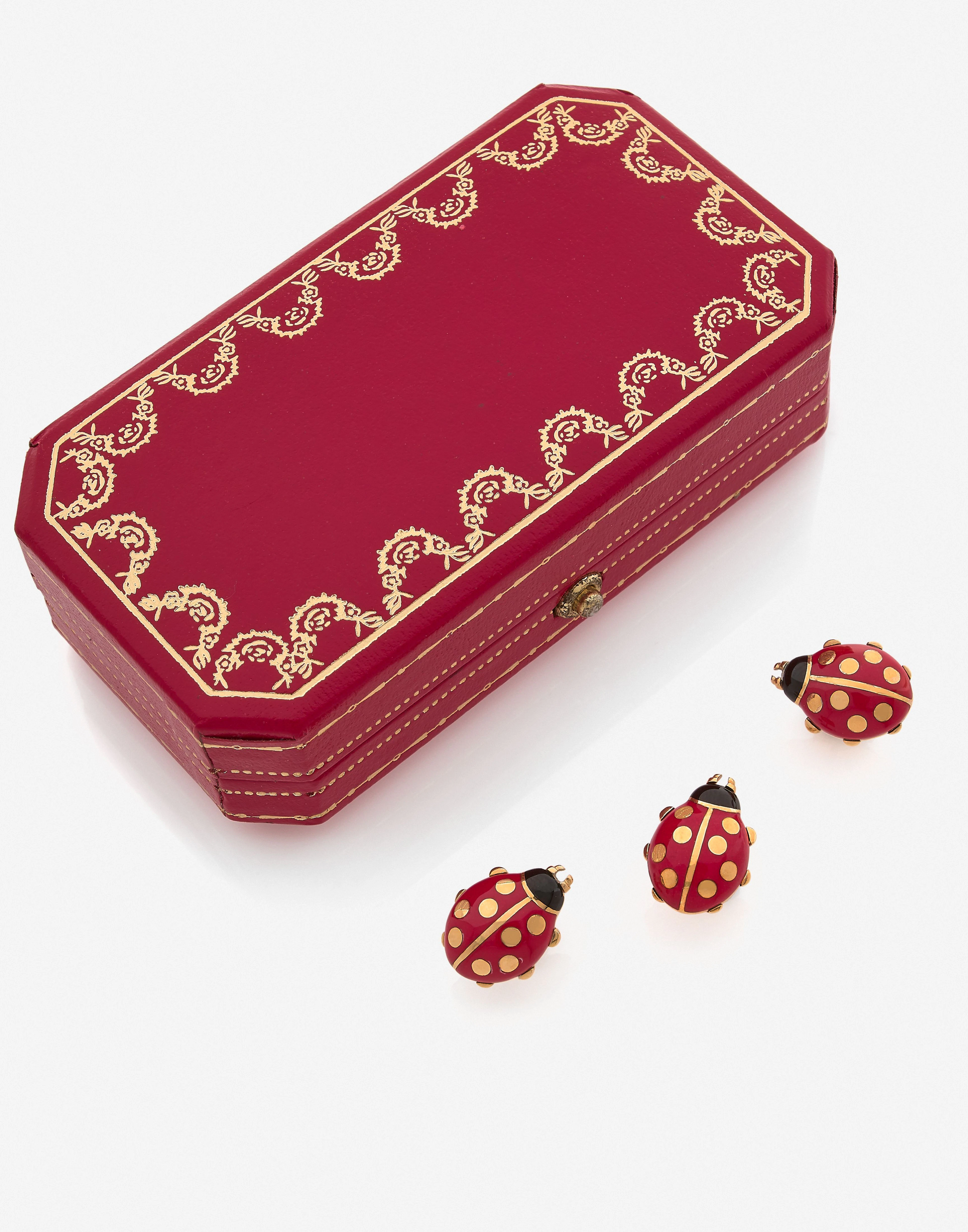 CARTIER Trois pin's "Coccinelle" en or