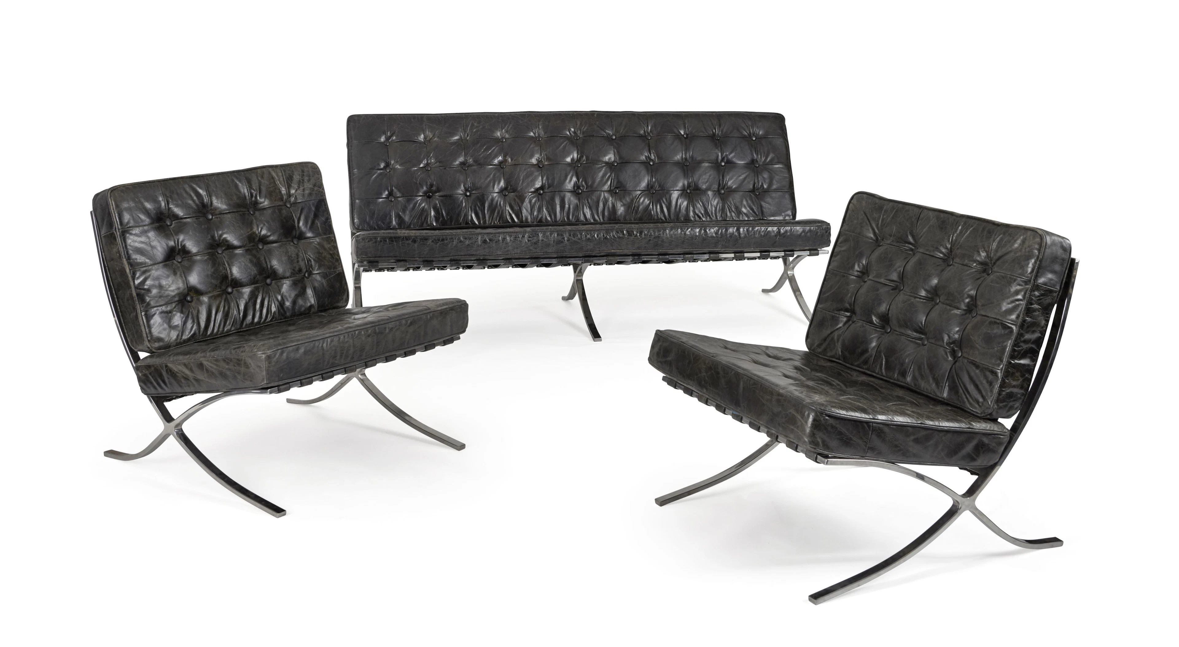 MOBILIER DE SALON, D'APRÈS LE MODÈLE DIT "BARCELONA" DE LUDWIG MIES VAN DER ROHE