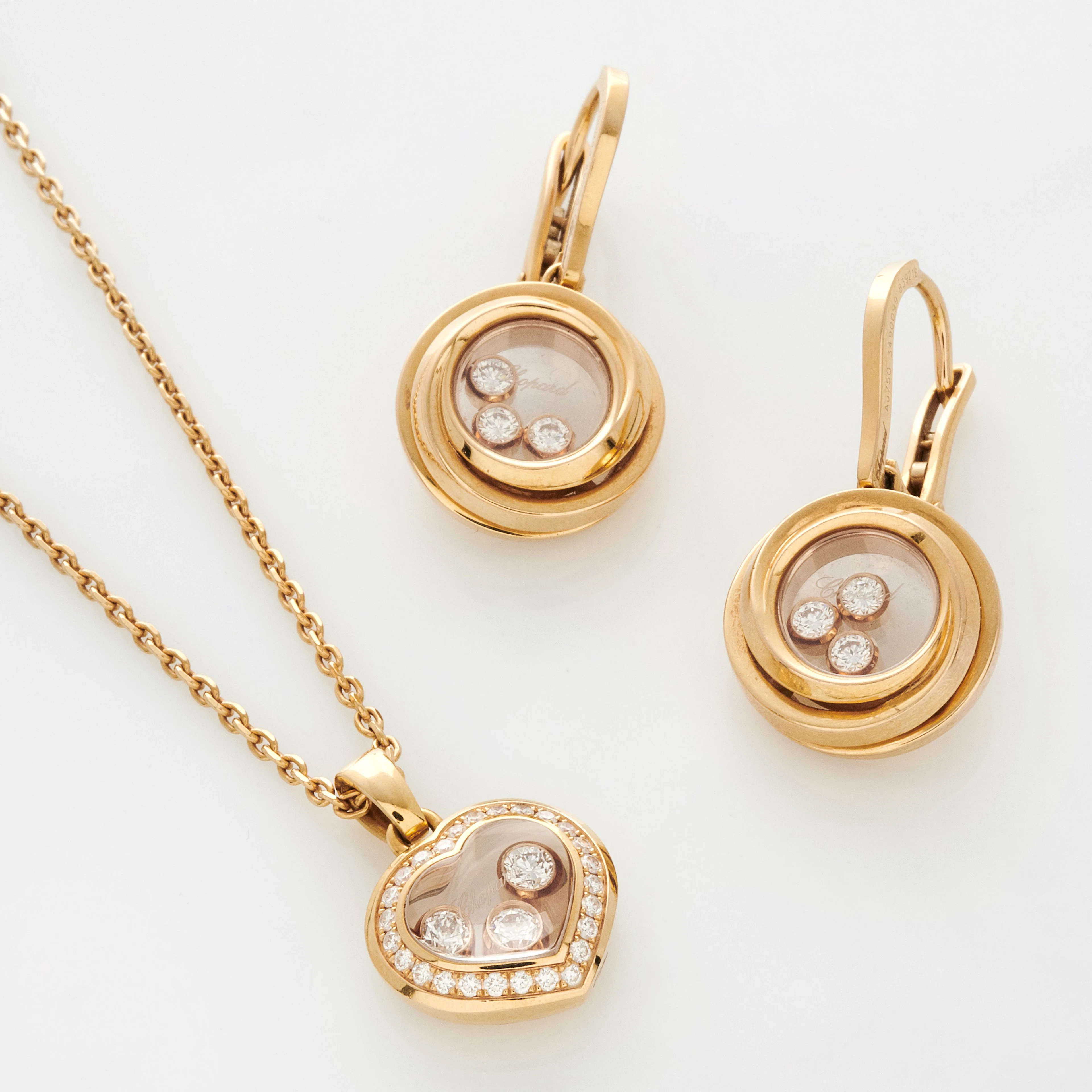 CHOPARD Collier et paire de pendants d'oreilles "Happy diamonds"