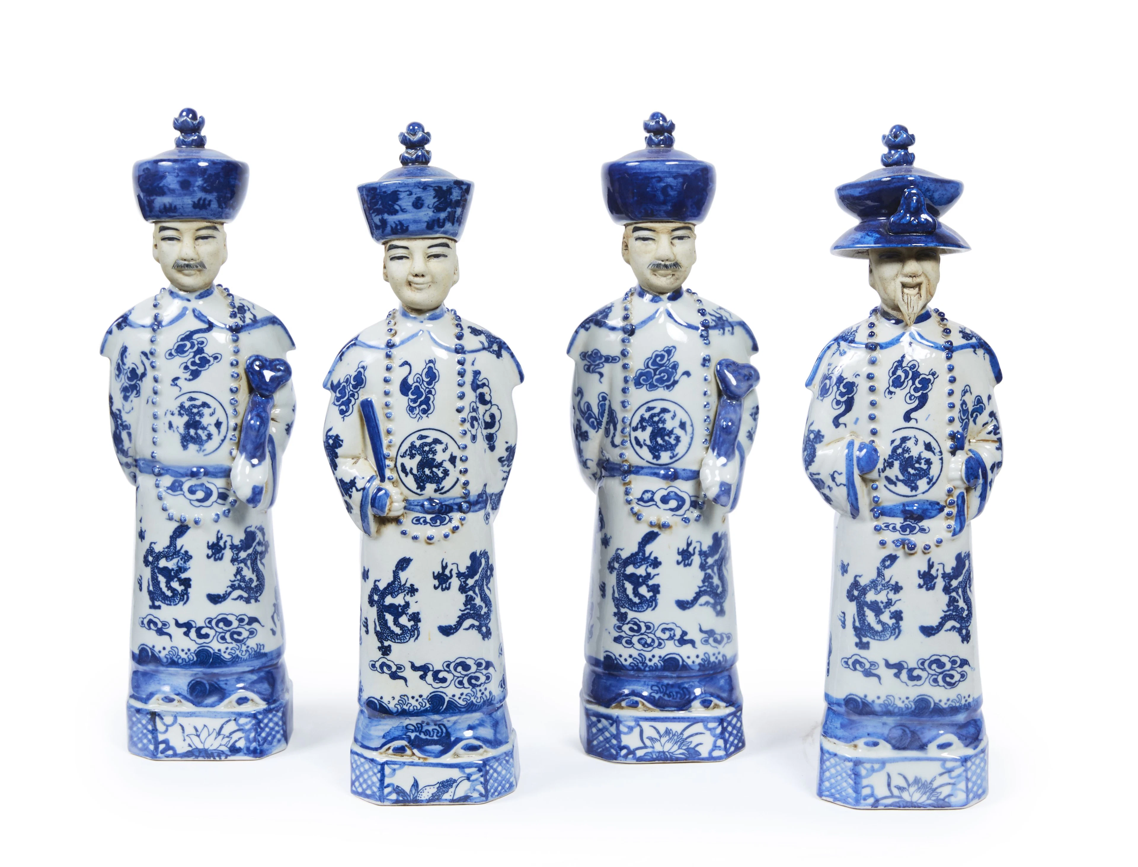 Ensemble de quatre figures de dignitaire chinois