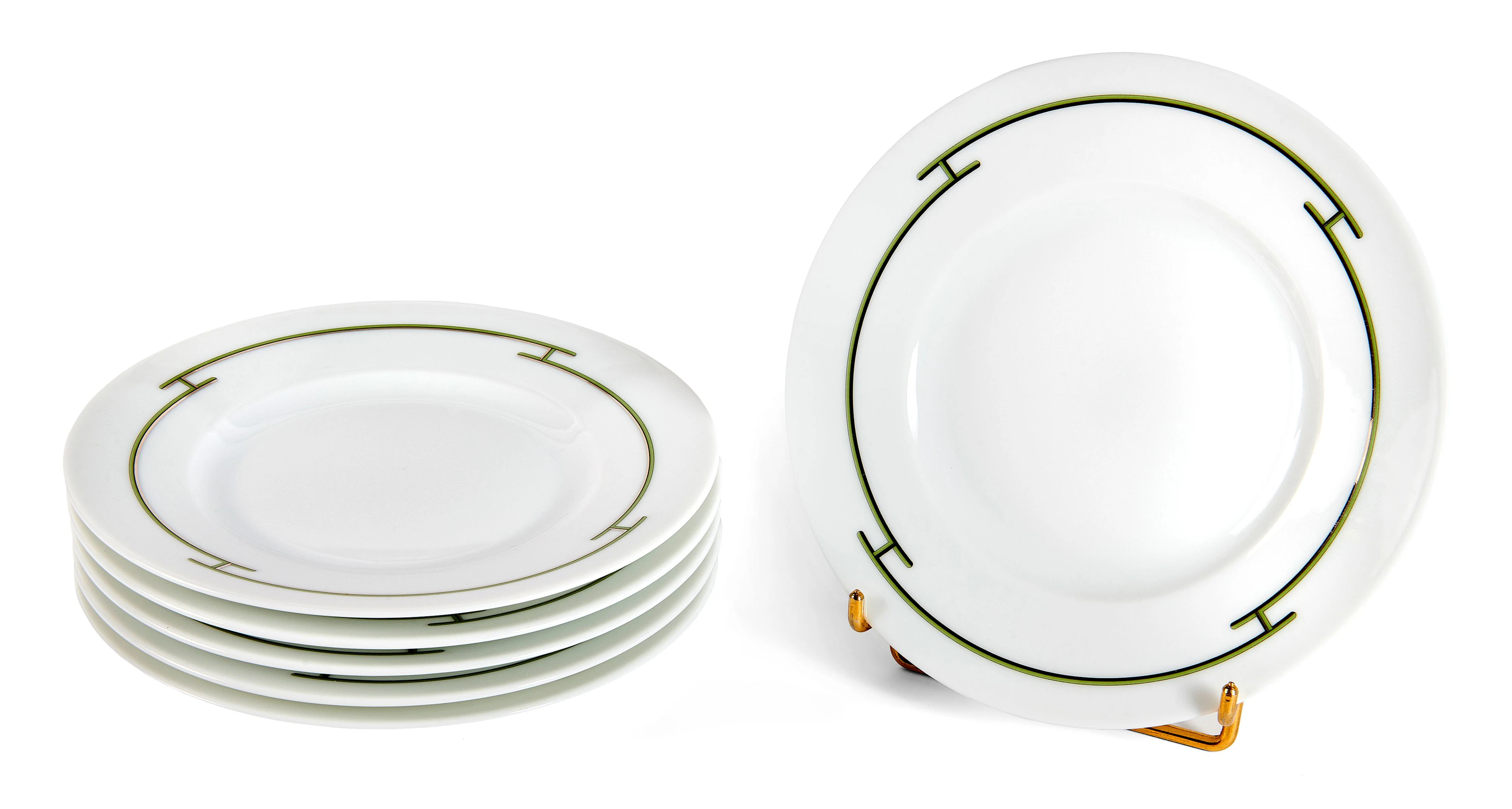 HERMÈS Lot de six assiettes à pain en porcelaine bordées...