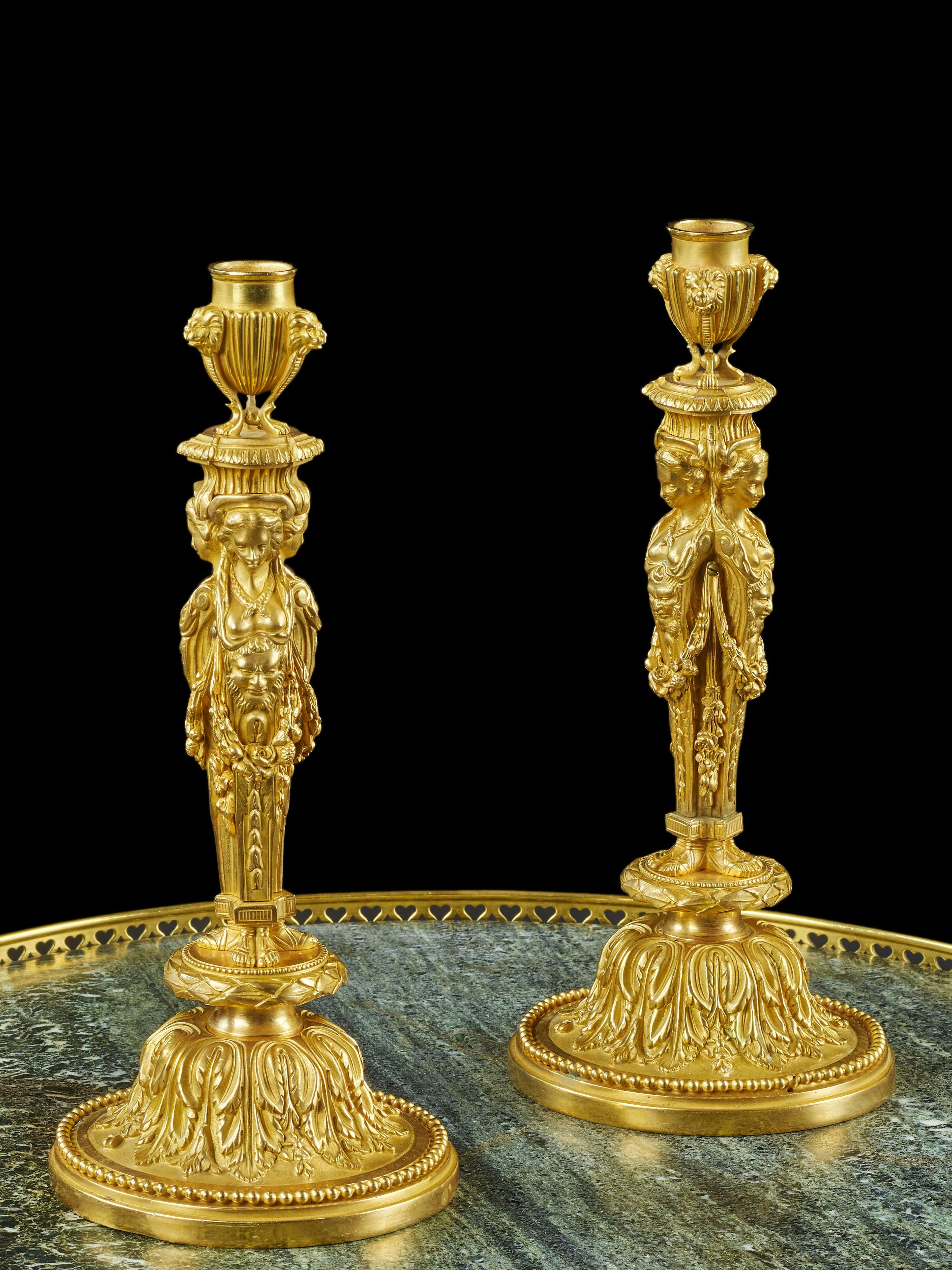 PAIRE DE FLAMBEAUX DE STYLE LOUIS XVI D'après François Rémond