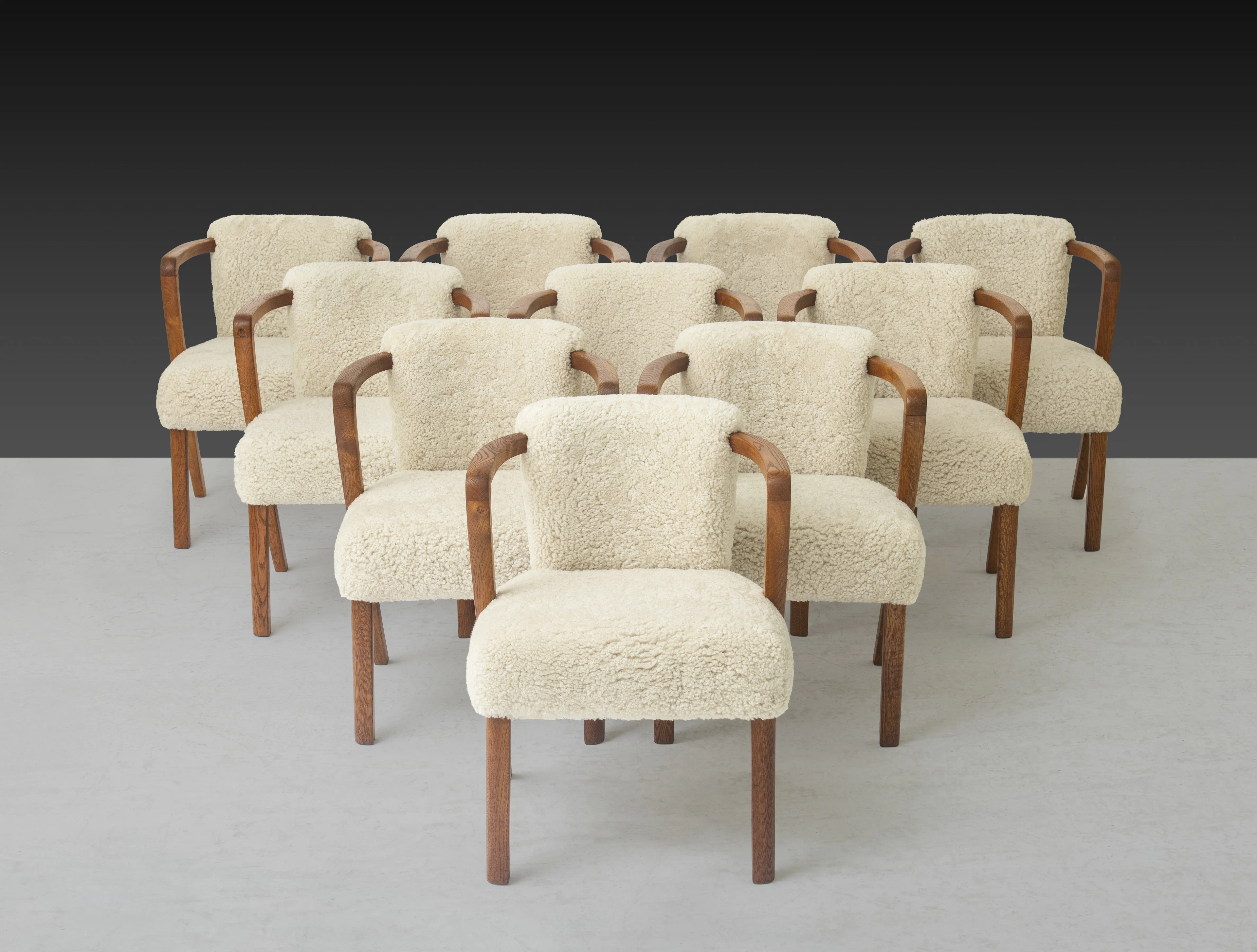 A set of ten oak and sheepskin mod