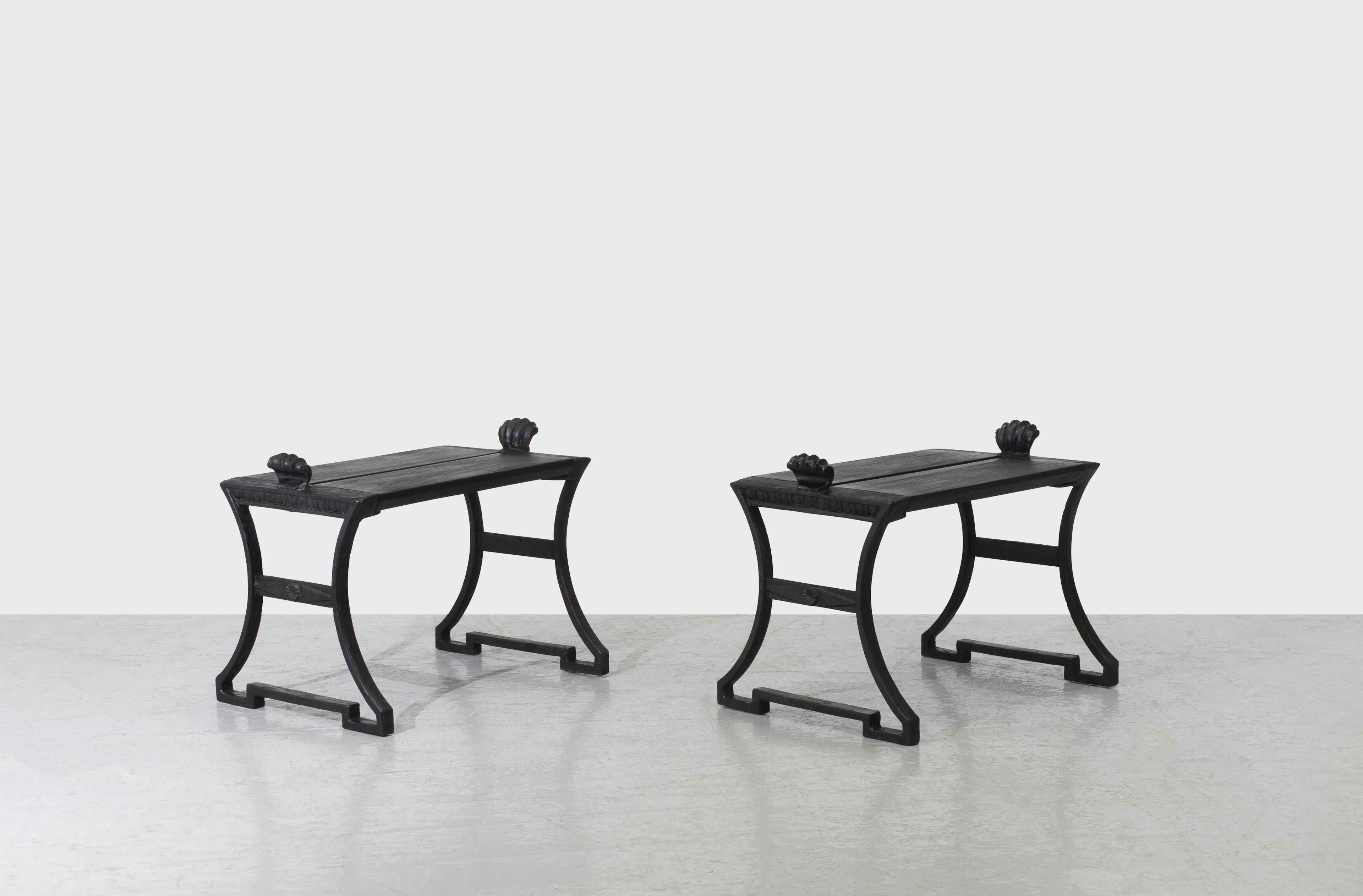 A pair of cast-iron and lacquered wood «Taburett N°3» or...