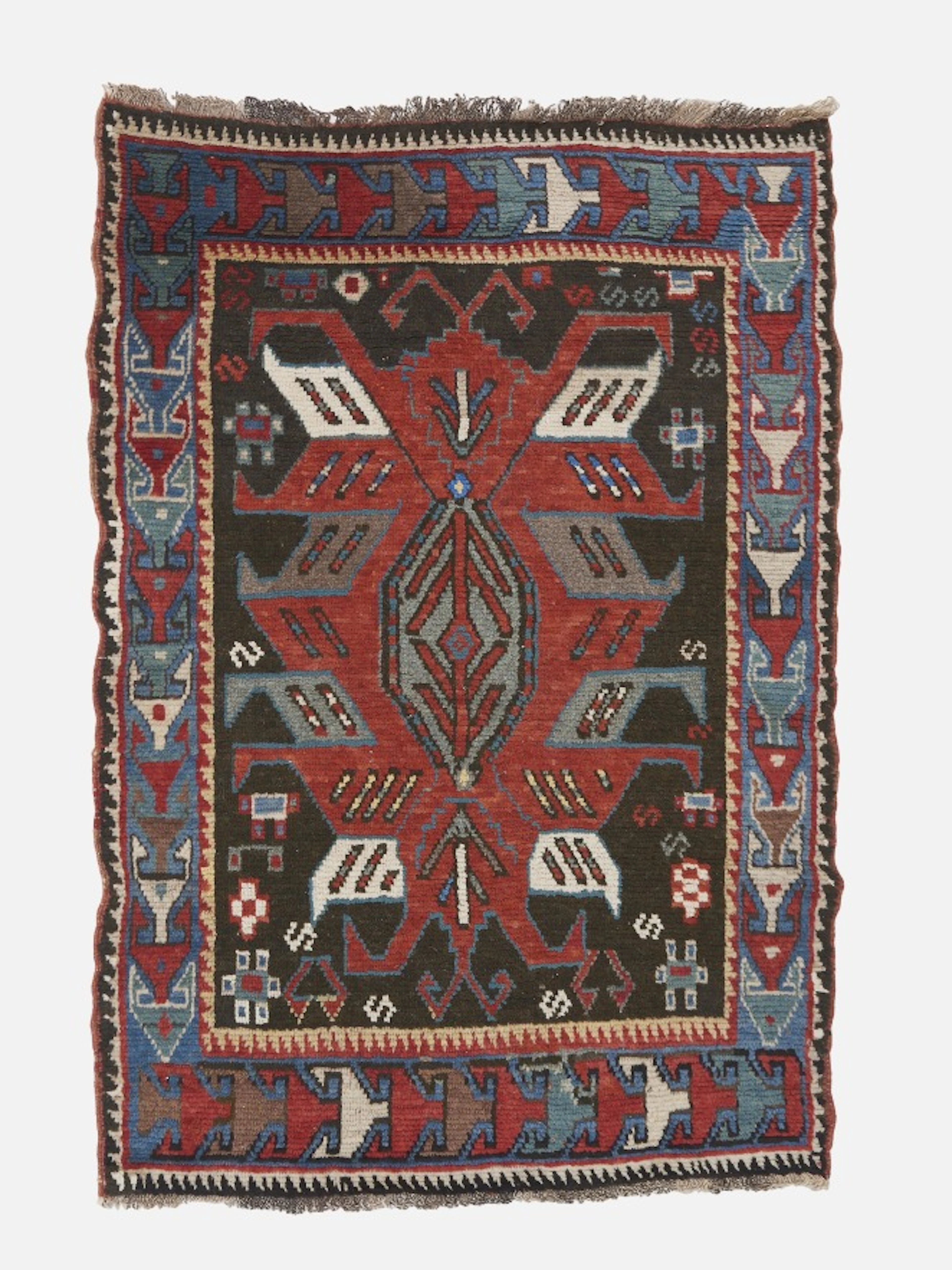 PETIT TAPIS CAUCASIEN AU MÉDAILLON AILÉ, KARABAGH, FIN DU XIXe SIÈCLE