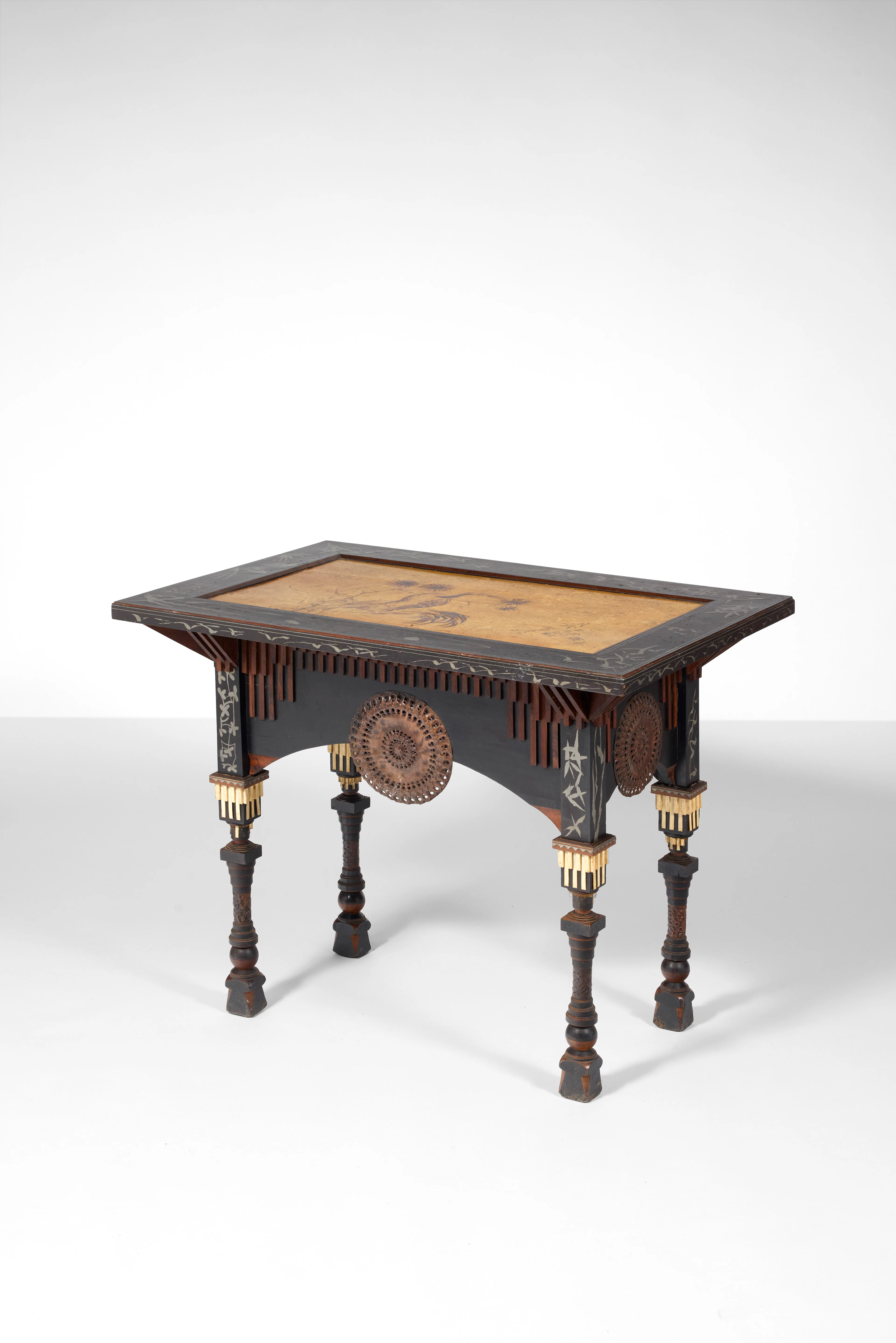 A wood inlaid with pewter
