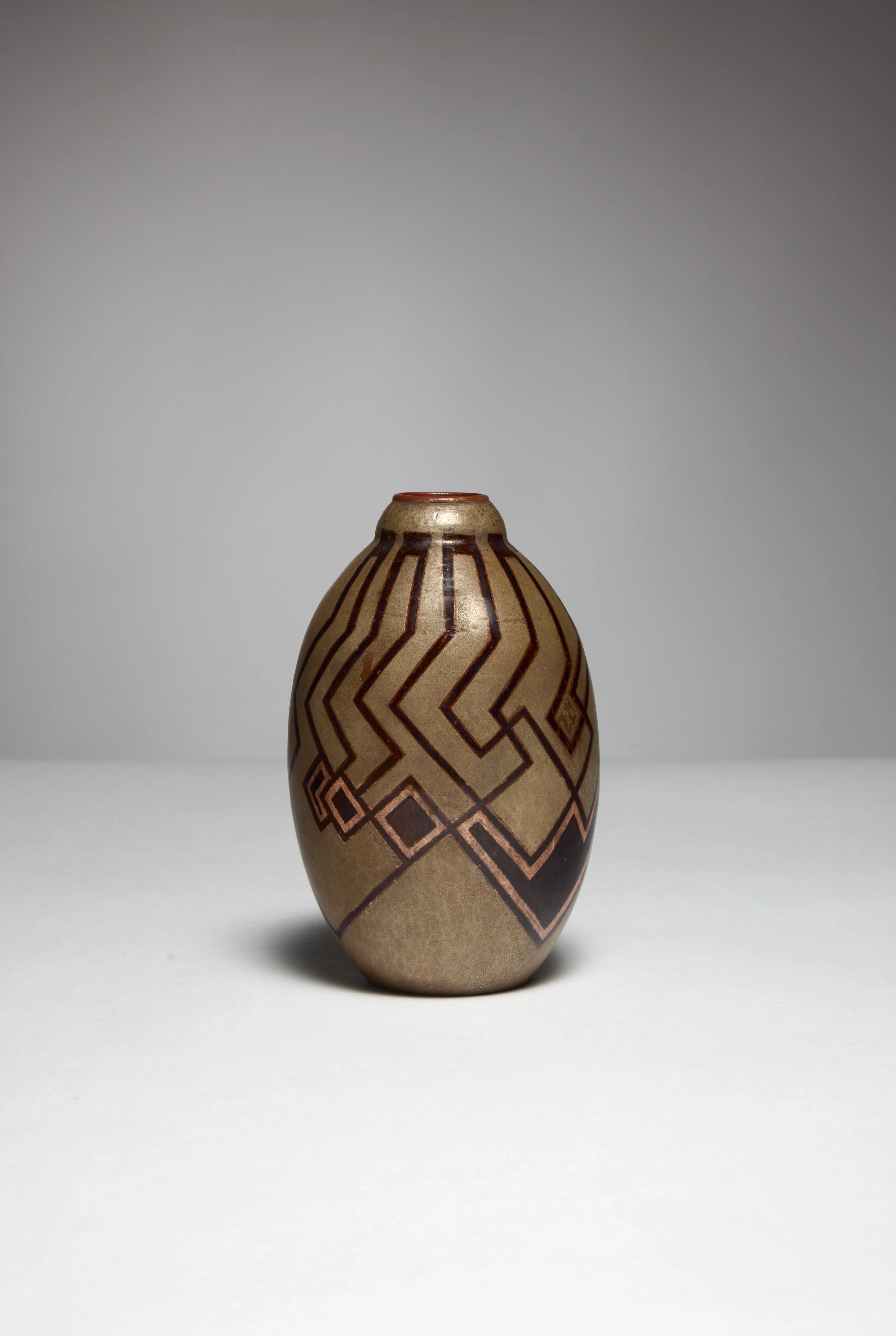 A lacquered dinanderie vase by Jean Dunand