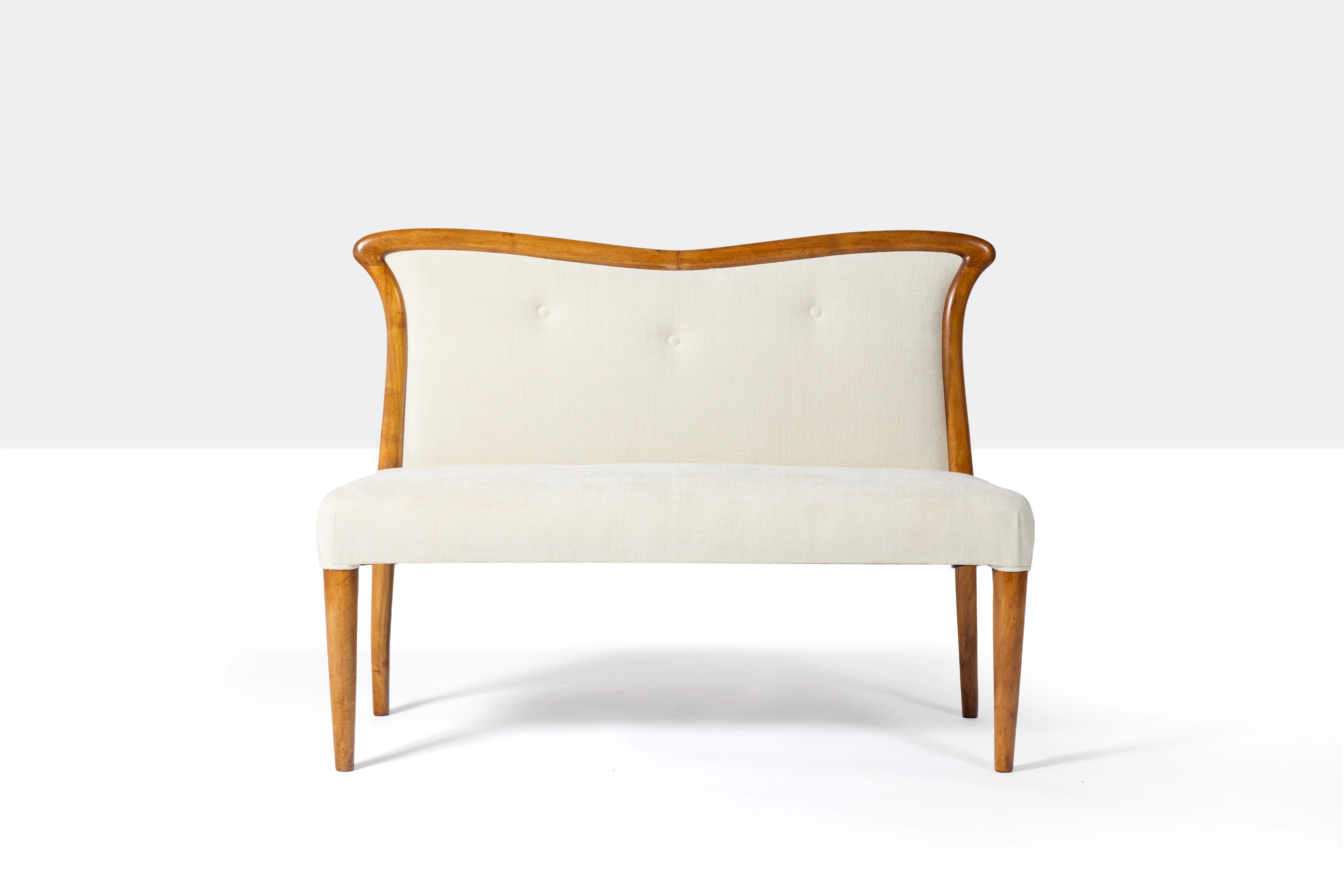 A walnut and fabric sofa by Osvaldo Borsani - circa 1950...