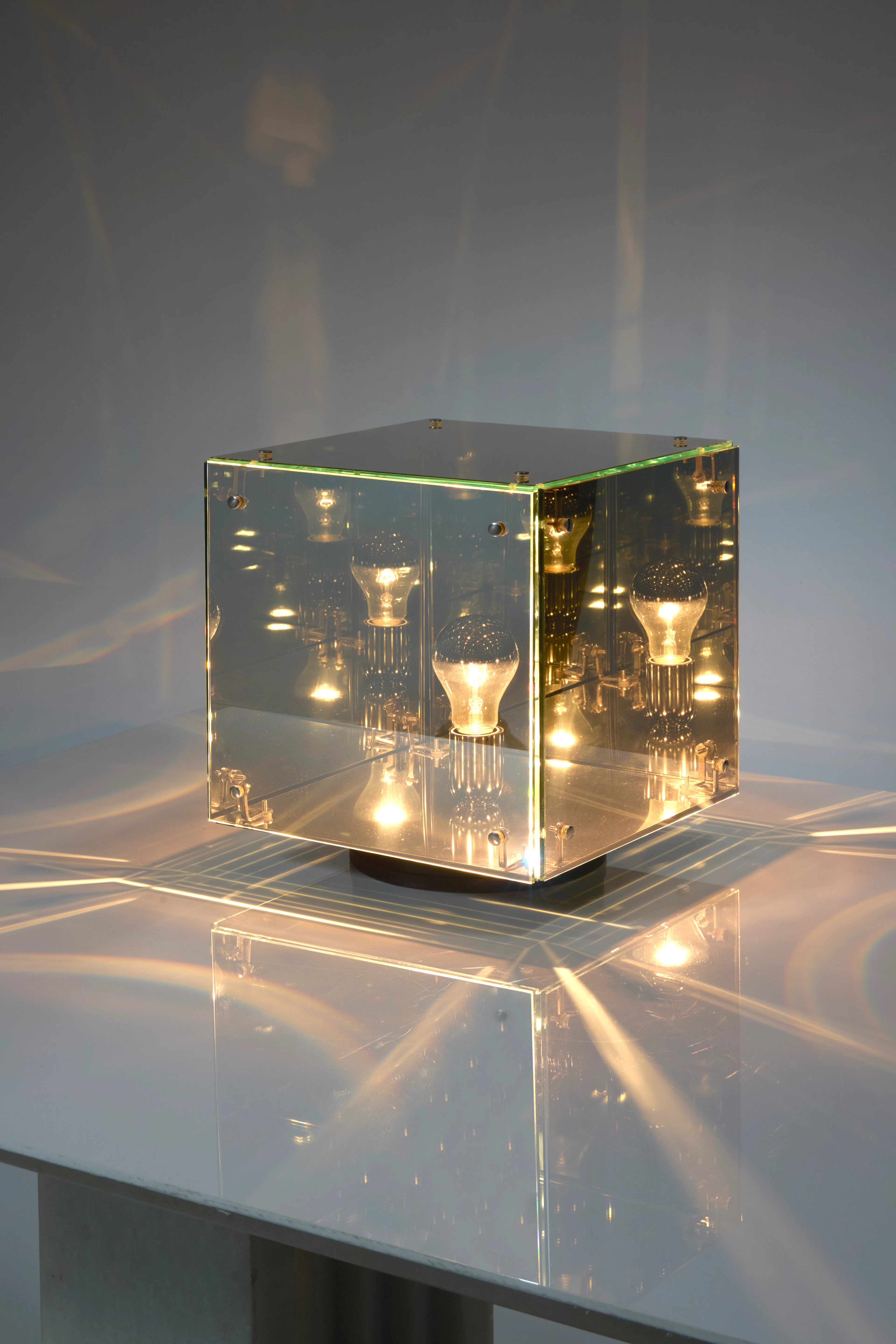 A chromed steel and mirropane “Prismar” table lamp by...