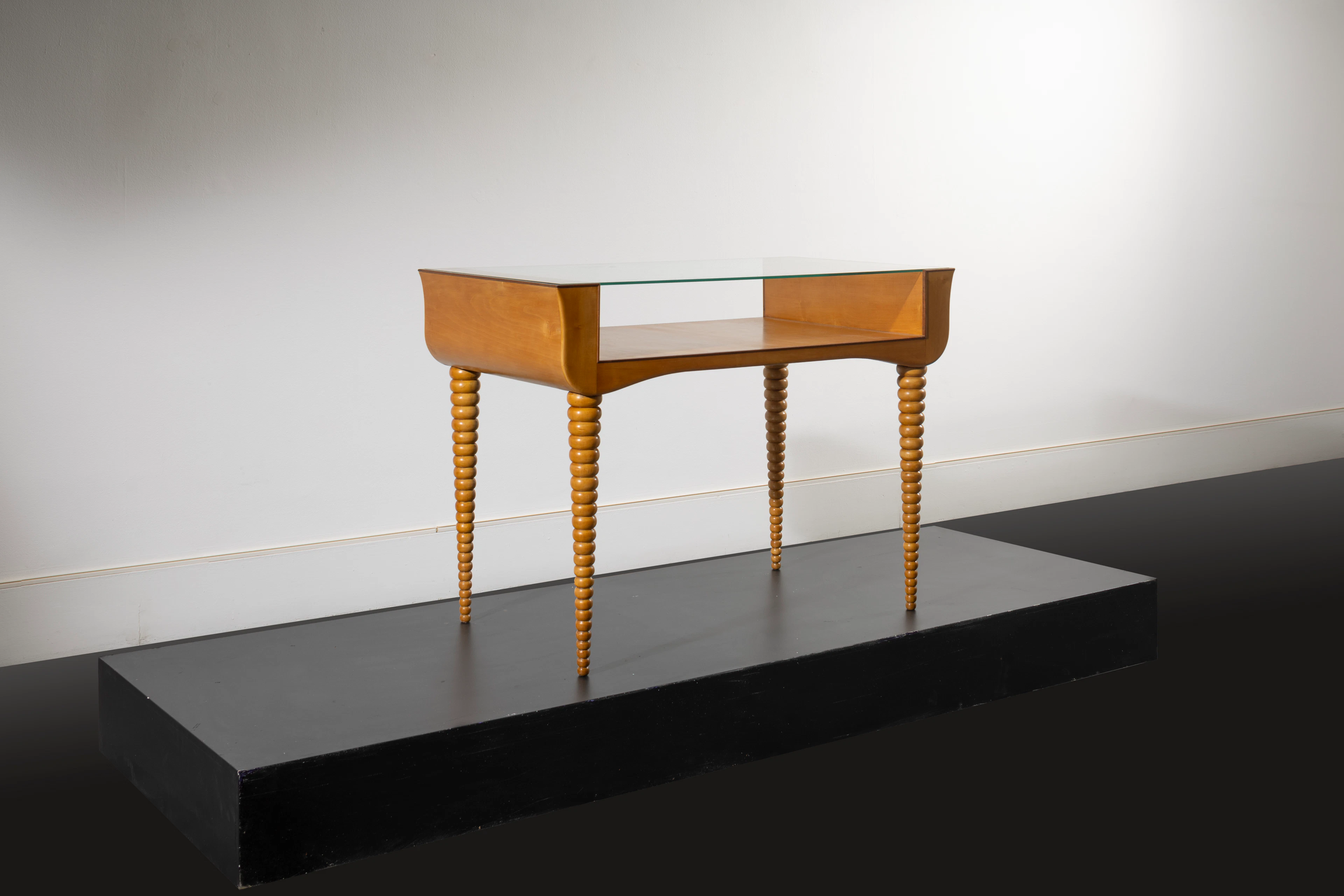 A walnut and glass console by Paolo Buffa - circa 1950 30.98 × 42.13 × 23.03 in.