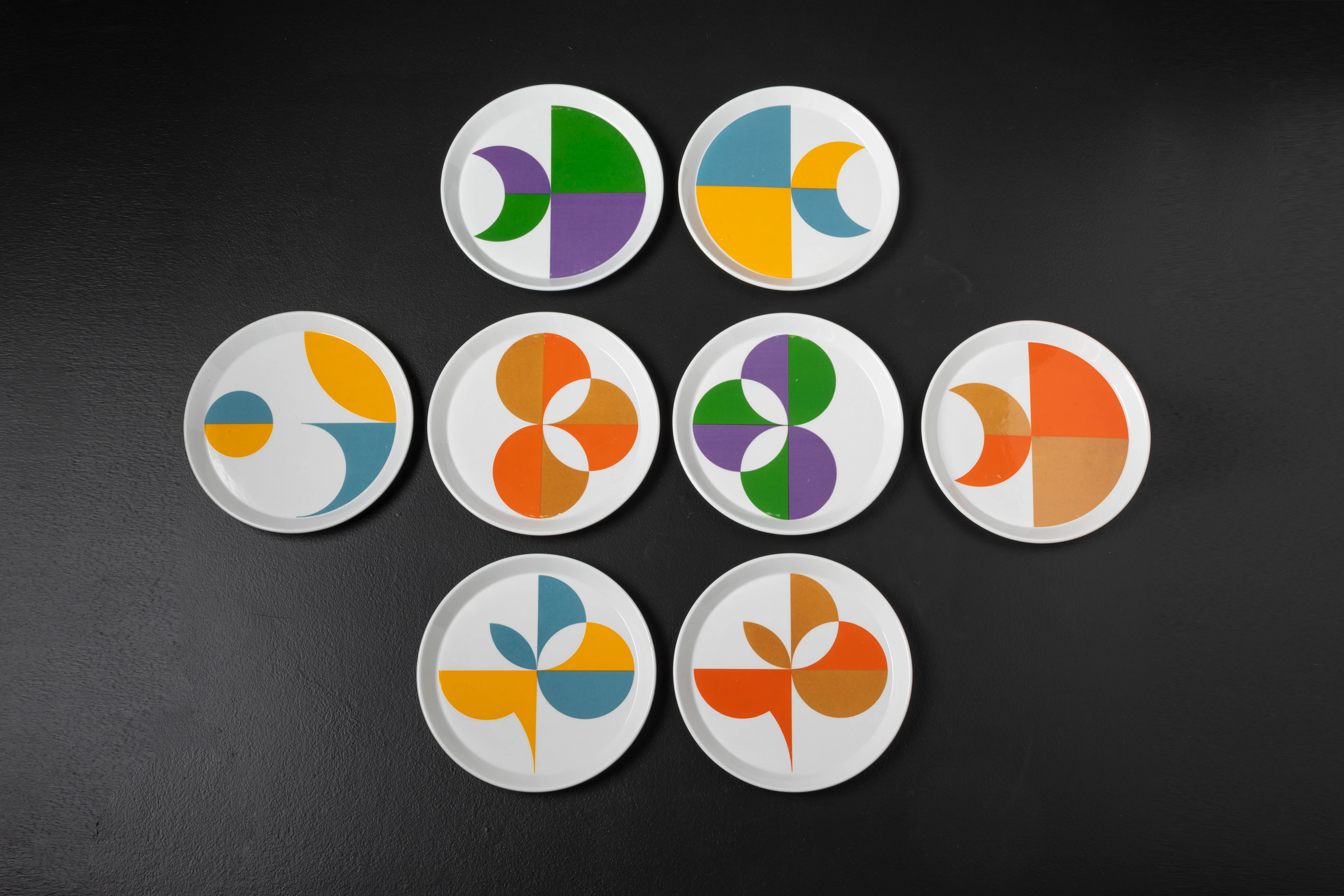 A set of eight white and colors enamelled “Primavera”...