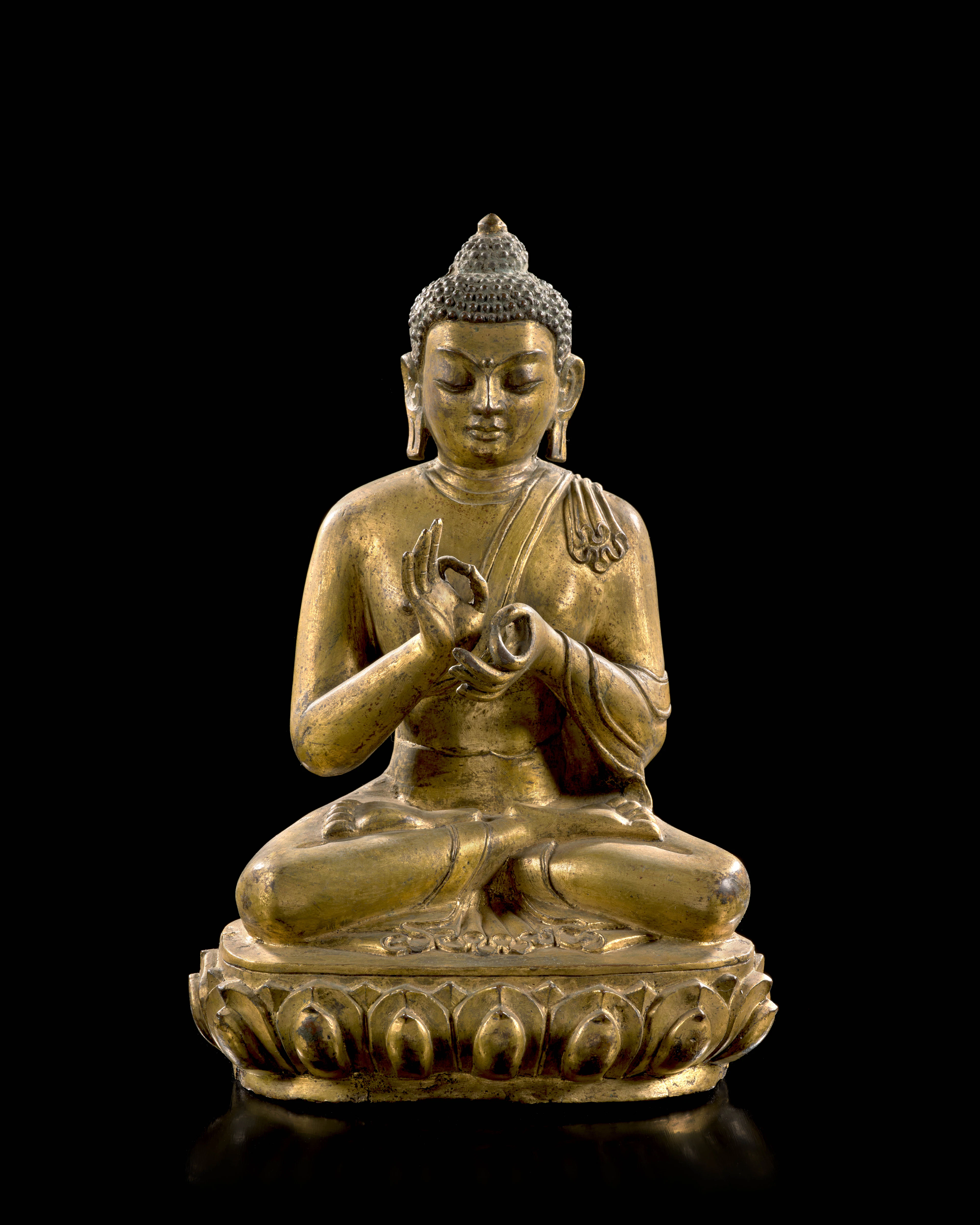 STATUETTE DE BUDDHA DIPANKARA EN BRONZE DORÉ, Tibet, XVIe siècle