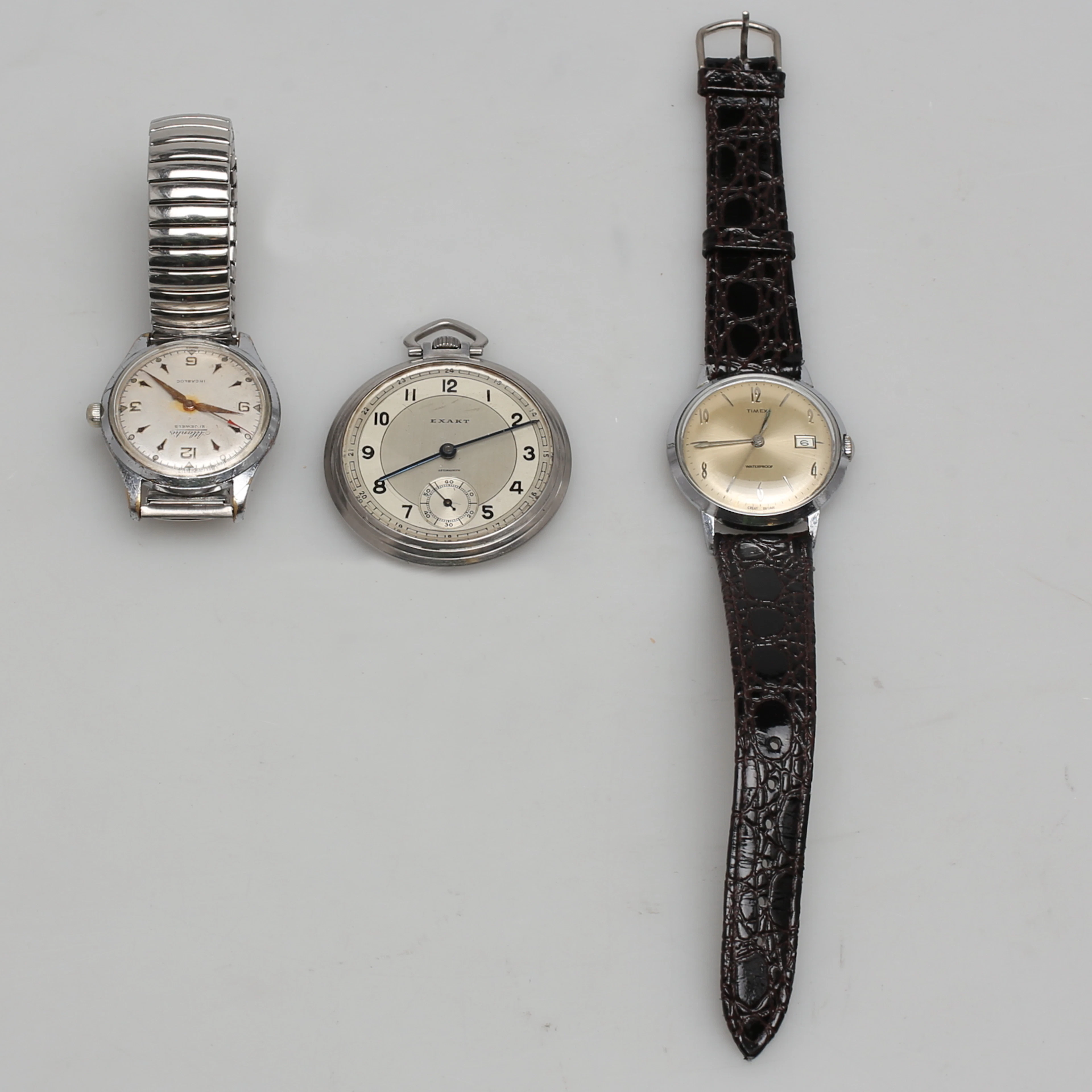 KLOCKOR. 3 st. Armbandsur samt fickur. Timex. Atlantic. Exakt.