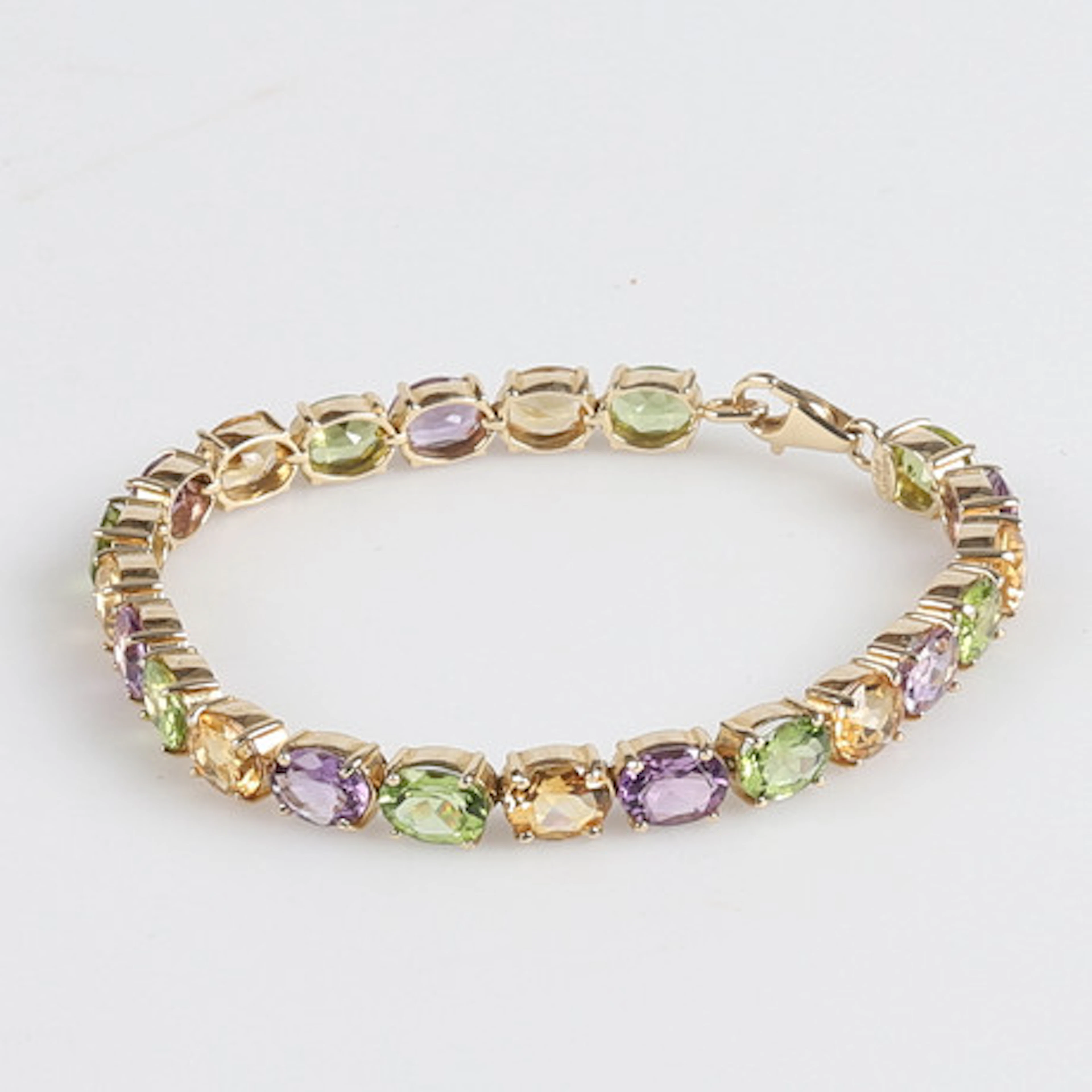 ARMBAND, 14K guld, Peridot 10 ct, Ametist …
