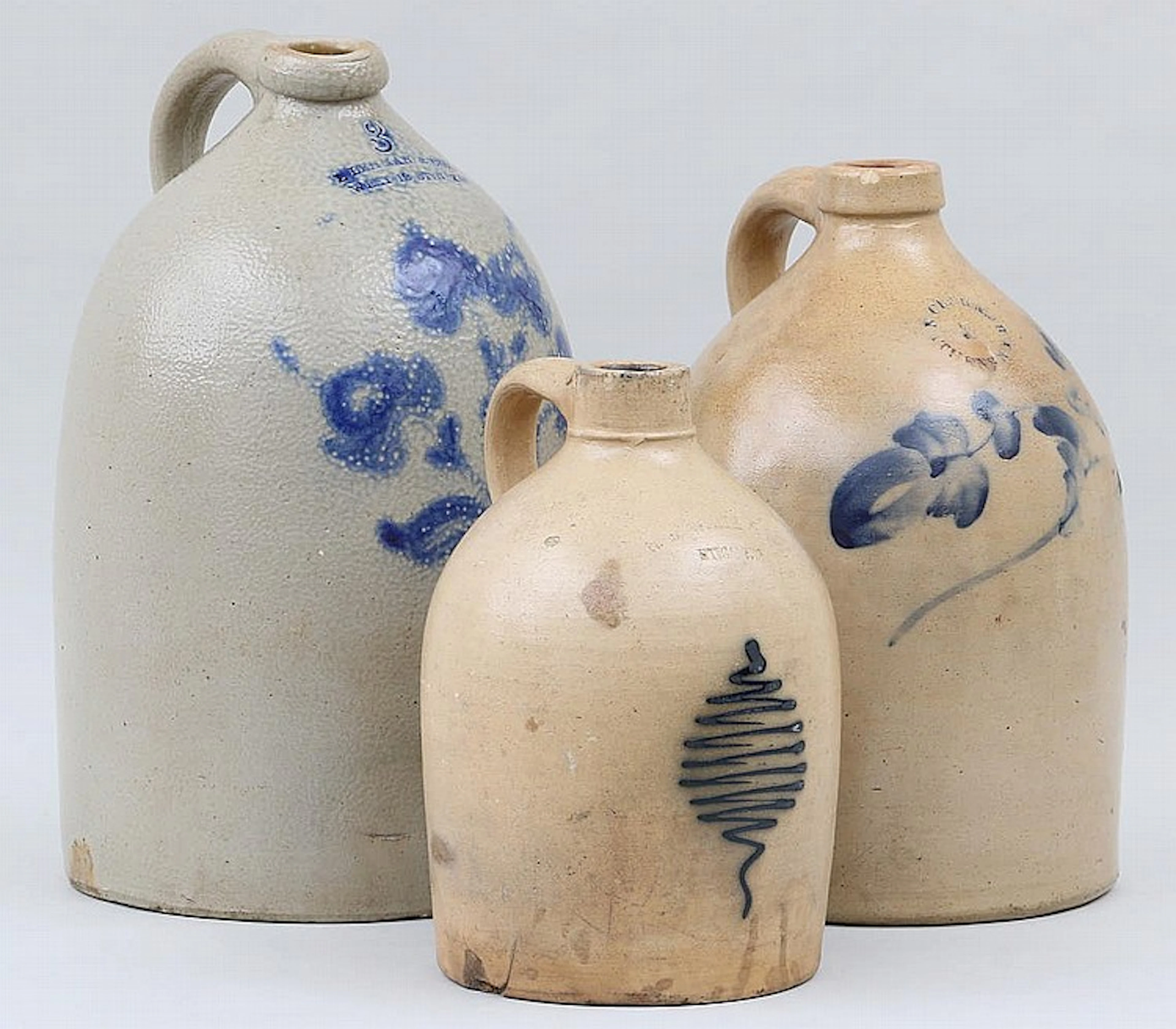 Group of (3) graduated New York stoneware jugs