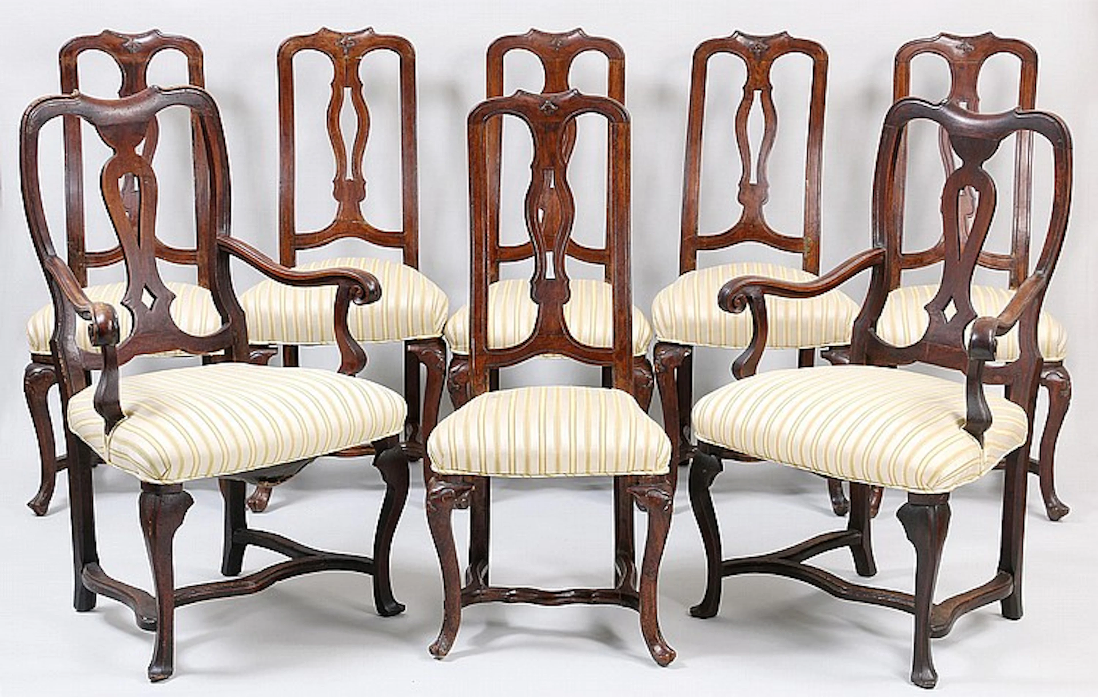 Venetian Louis XV carved walnut chairs