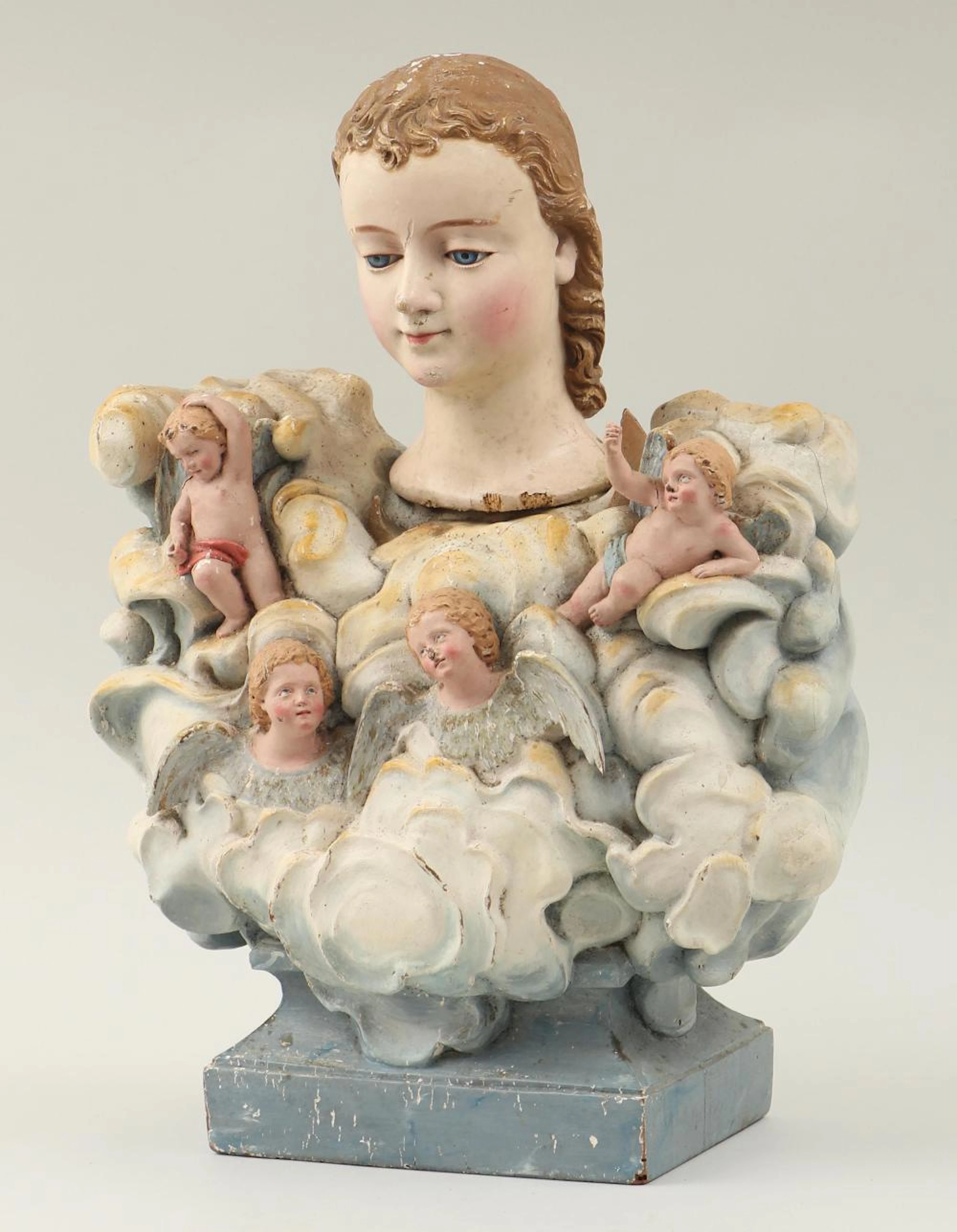 Polychrome carved santos