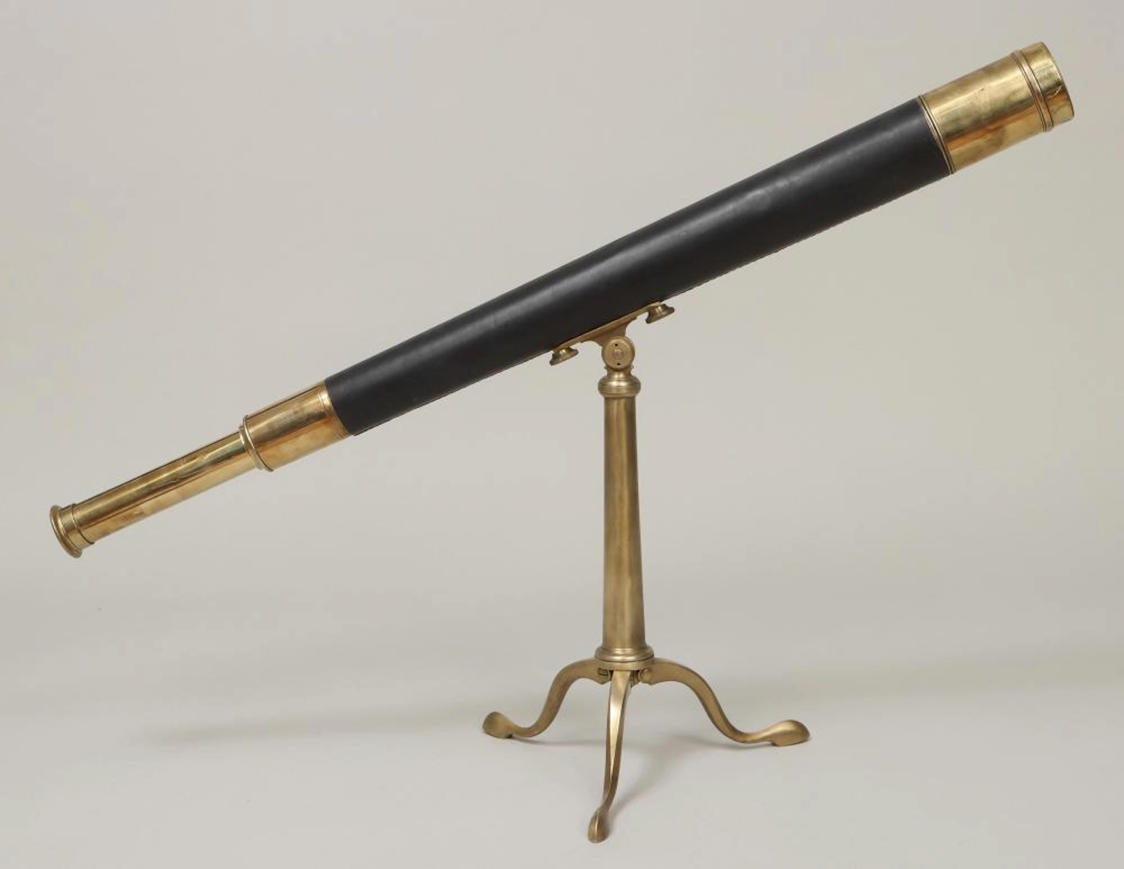 Leather-wrapped single-draw brass telescope
