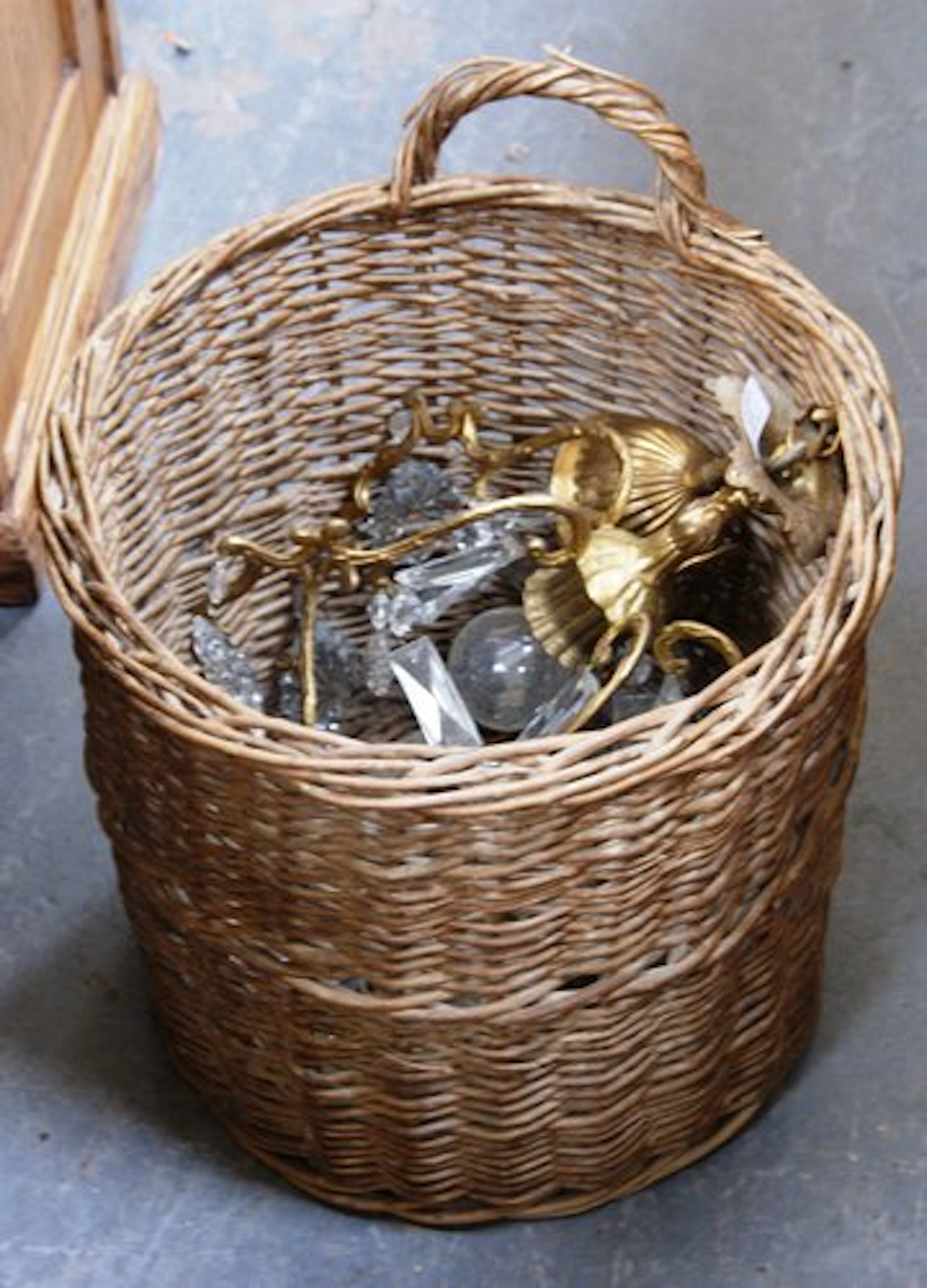 Gilt metal and cut-glass chandelier and a wicker log basket