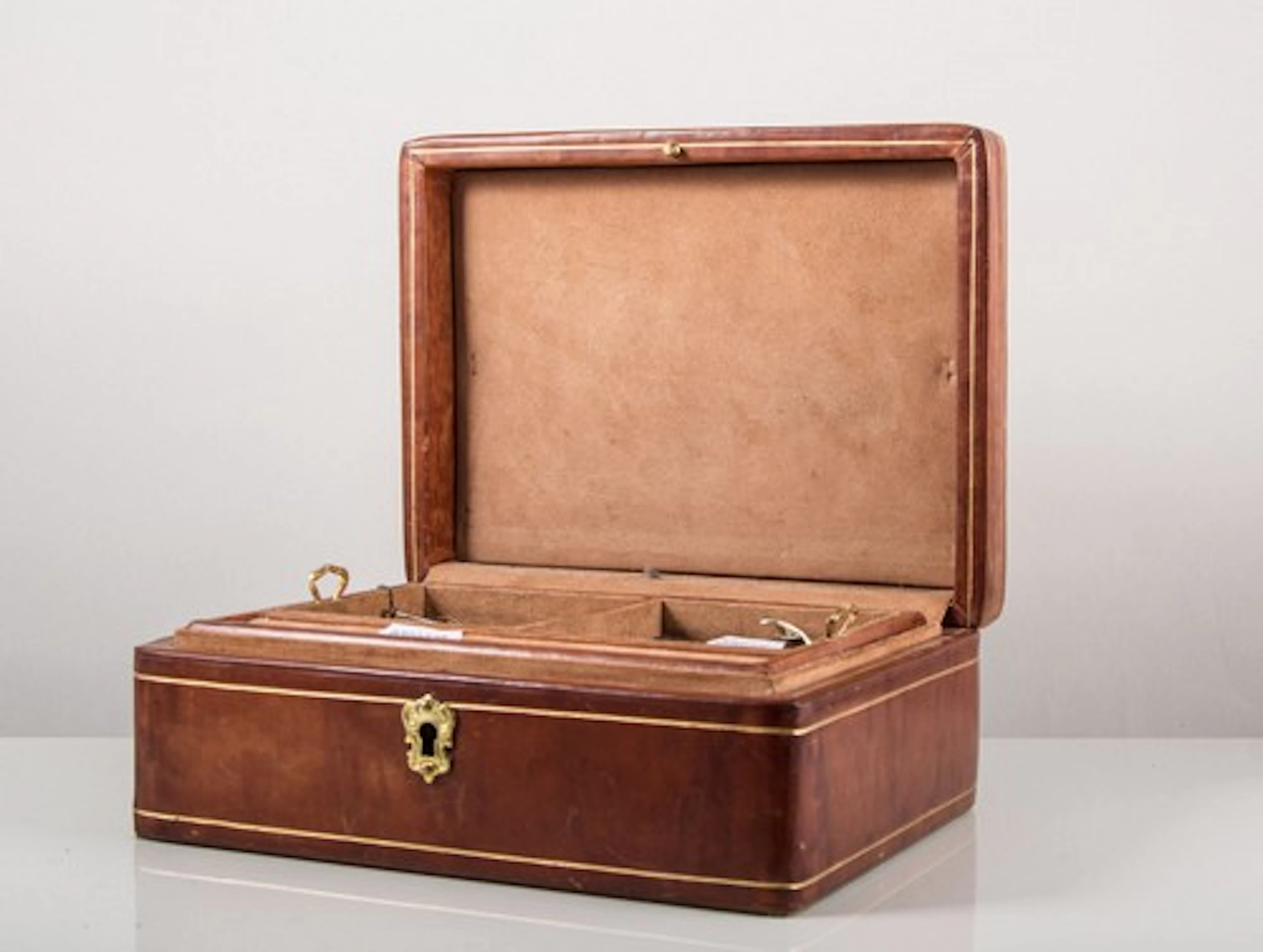 Brown leather Italian jewel box with lift out tray with a cameo brooch