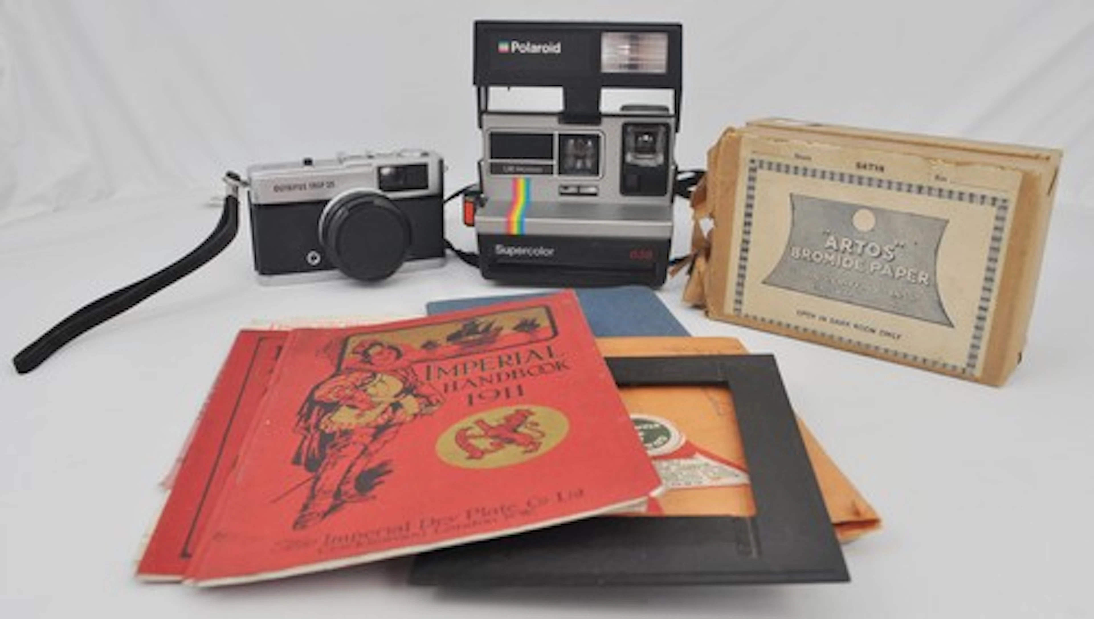 Photographic equipment and Polaroid 635 camera