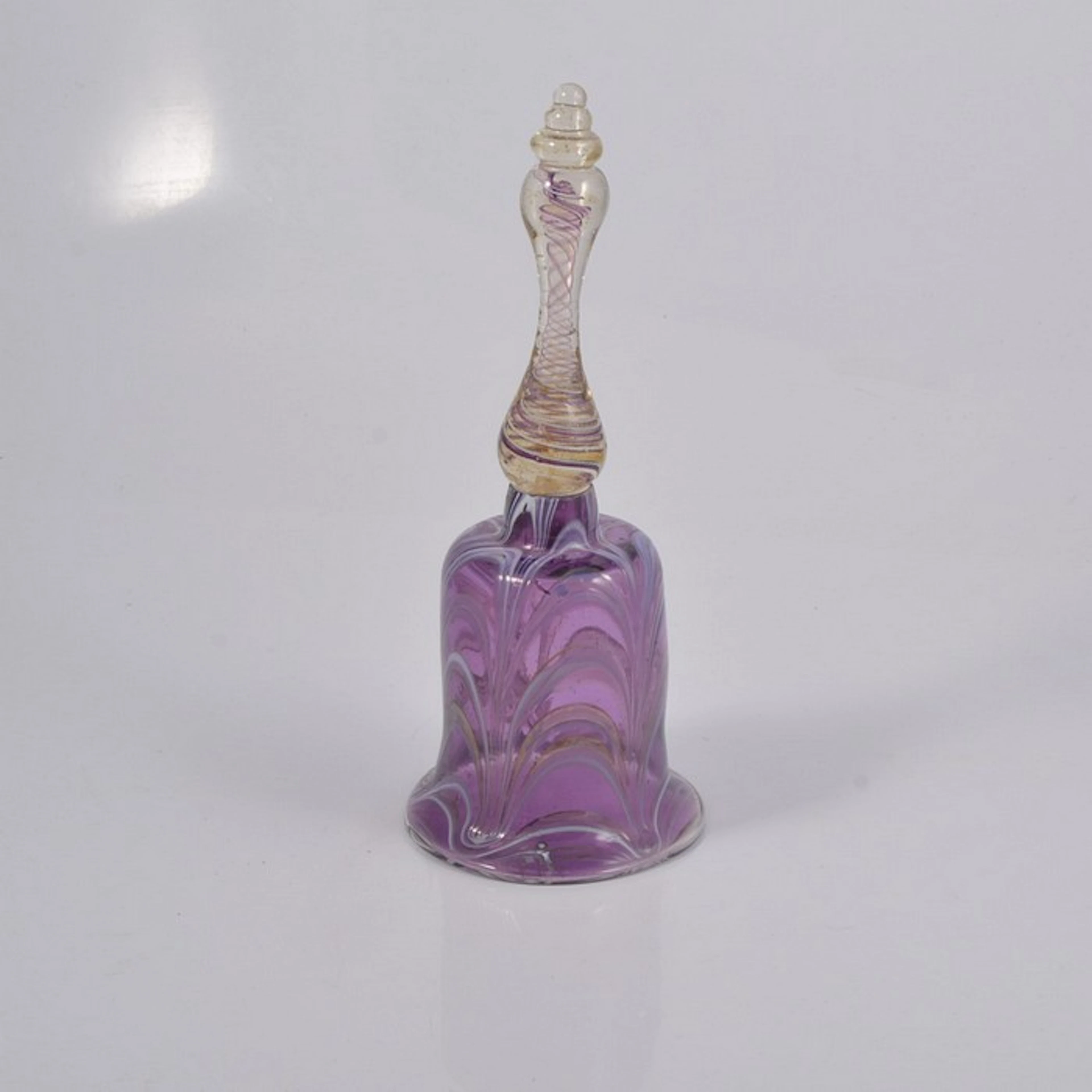 An amethyst festoon glass ornamental table bell