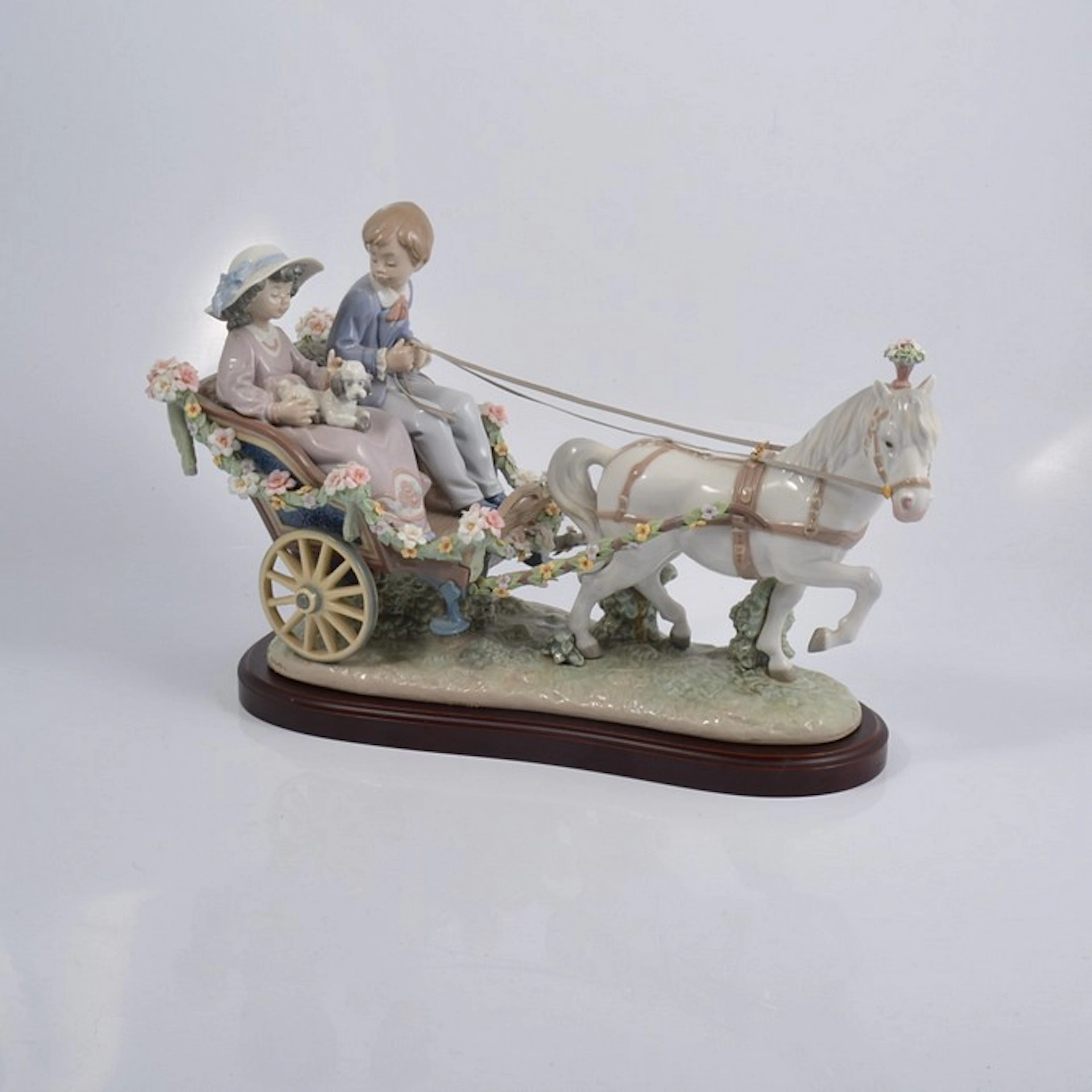 A Lladro figure group ''Ride in The Park'' modelled by Francisco Polope