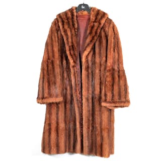 Two full length fur coats.
