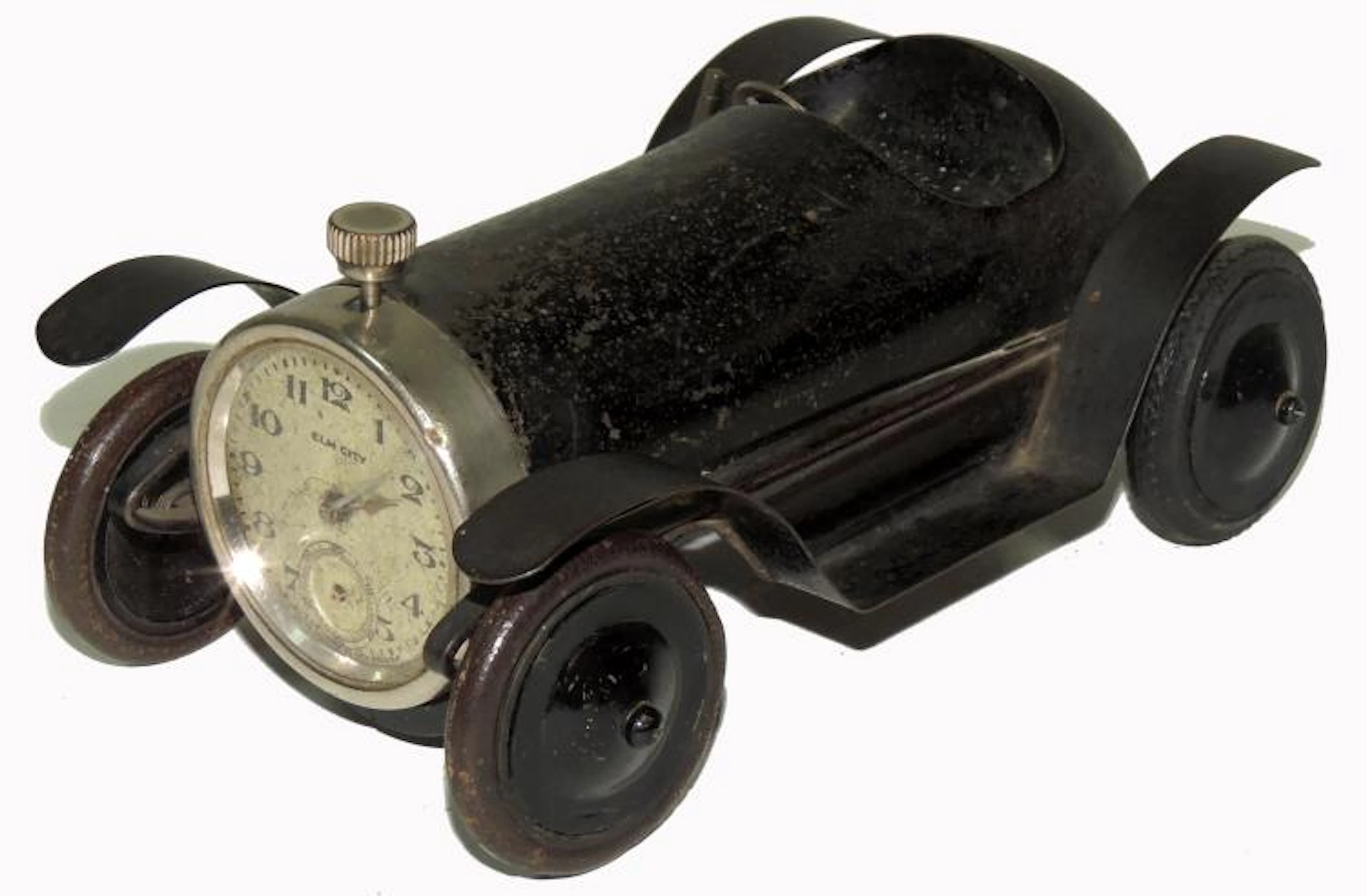 ELICITY. BRASS AND BRONZE CAR SHAPED TABLE CLOCK