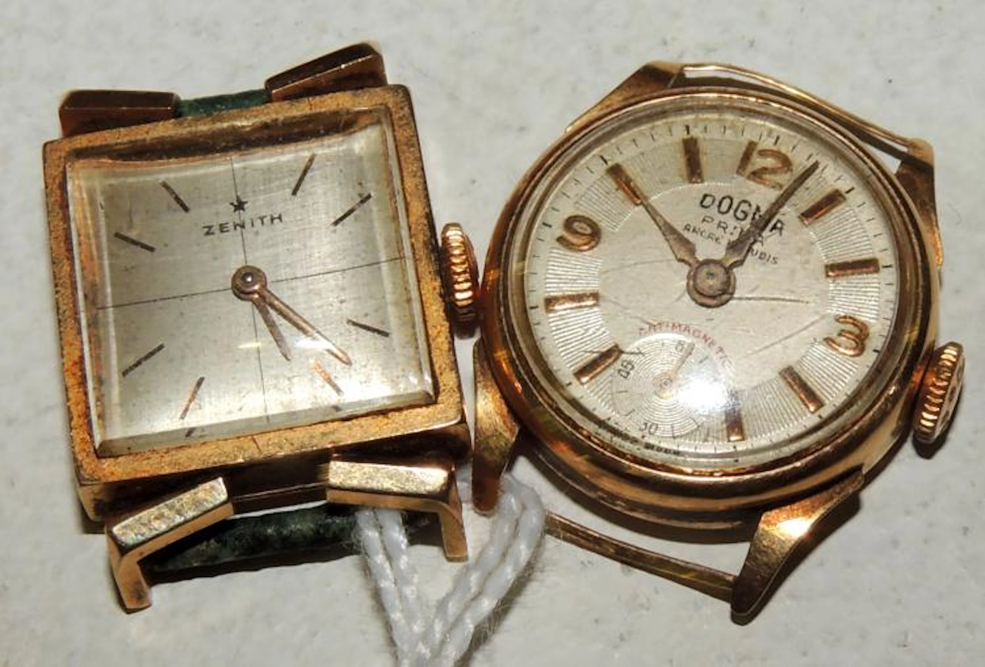 ZENITH AND DOGMA. TWO WATCHES OF LADY with yellow gold case.