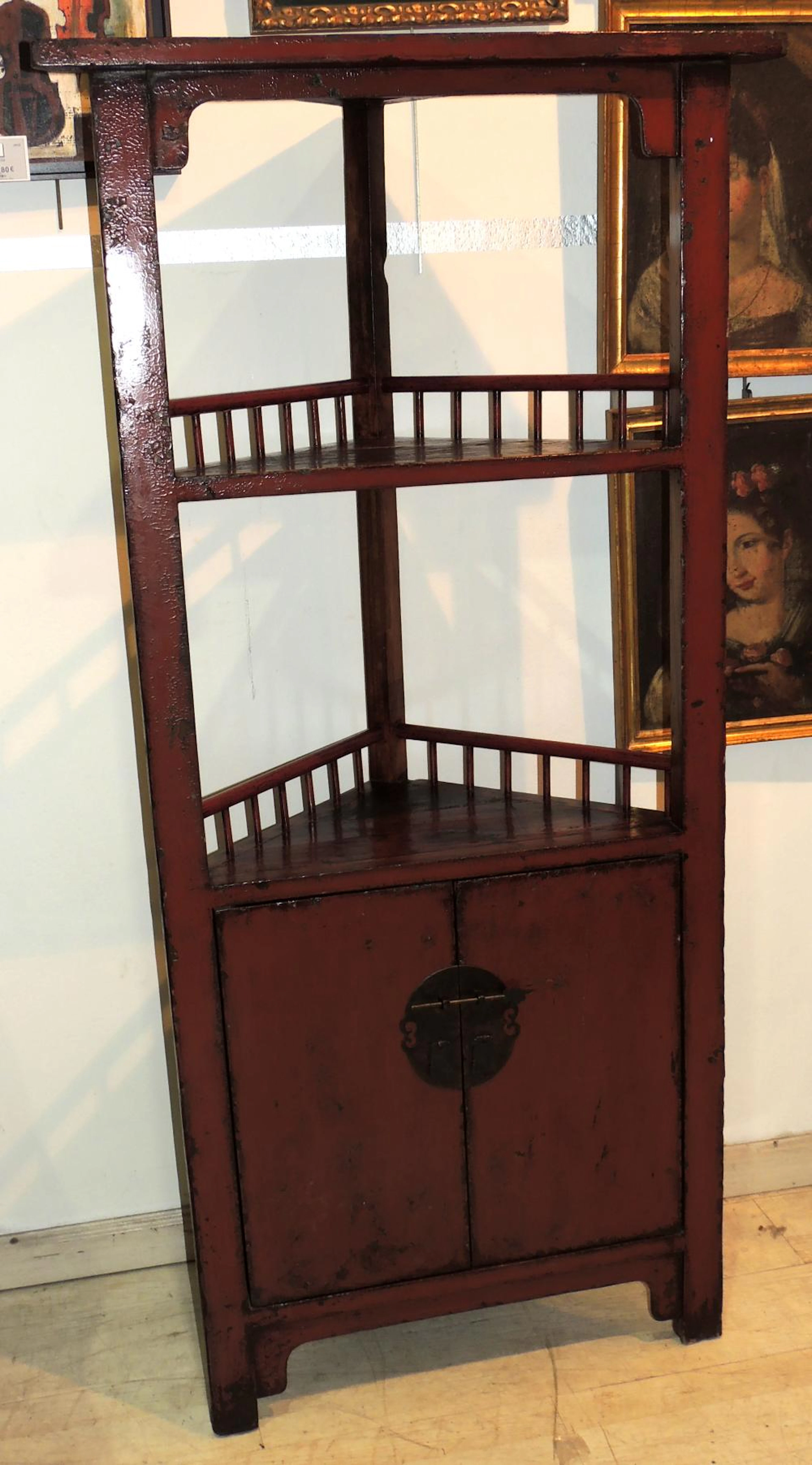 CHINESE CORNER FURNITURE of patinated wood with two shelves with...