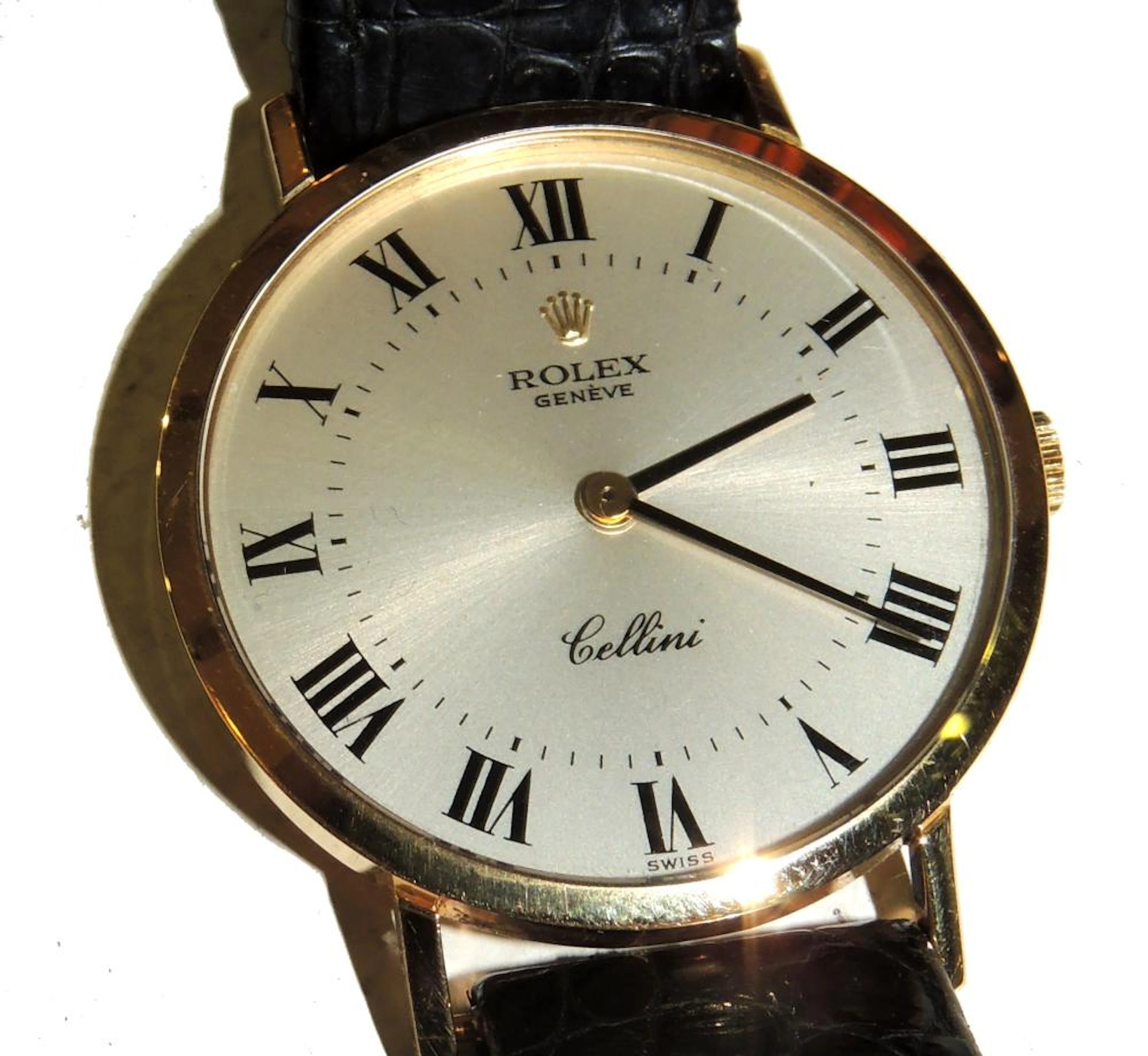CELLINI ROLEX CLOCK in yellow gold. Of rope. With black leather...