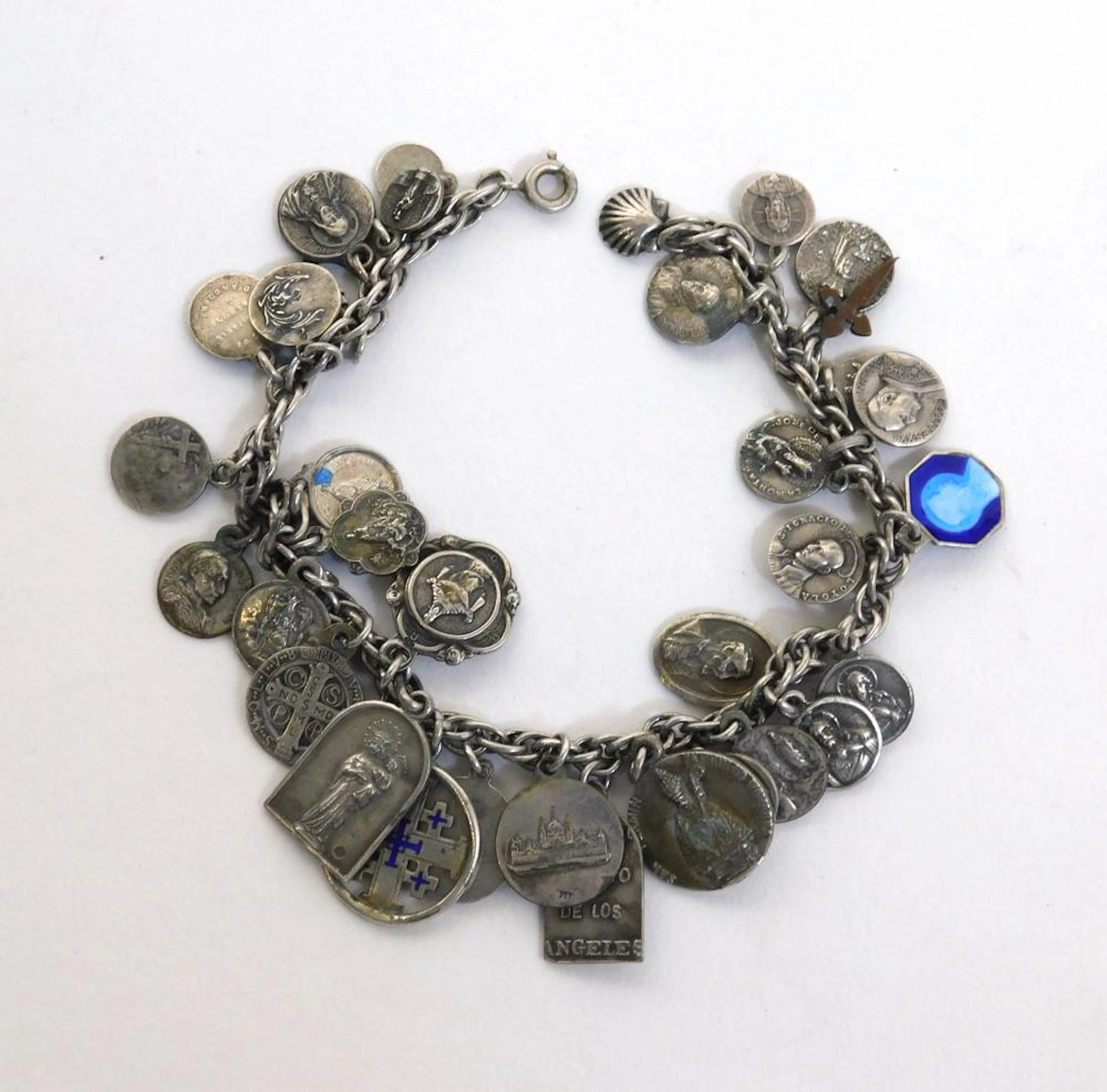 PULSERA en plata con medallas religiosas de distintos...
