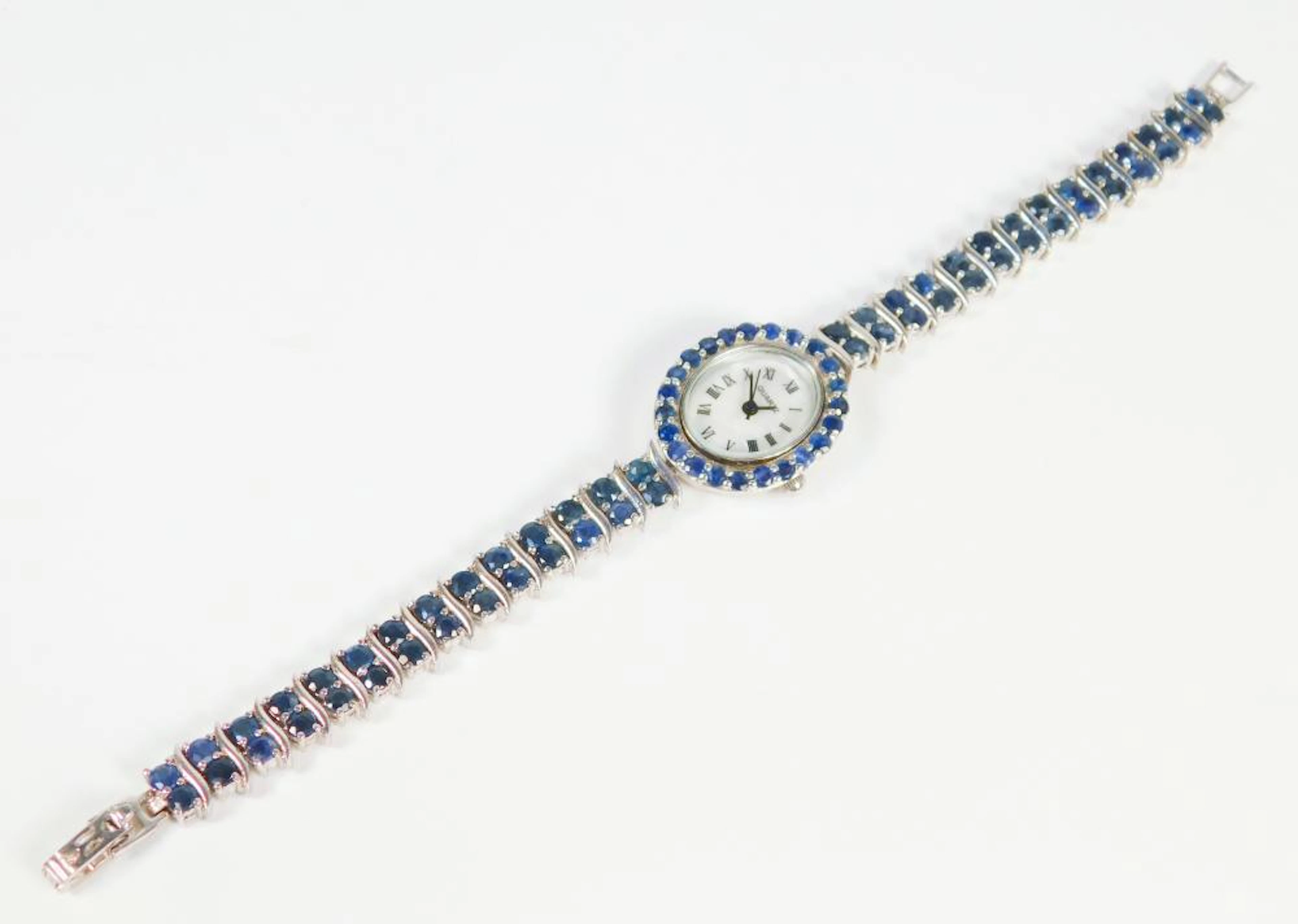 RELOJ JOYA DE ZAFIROS AZULES Y PLATA  Mecanismo de cuarzo.