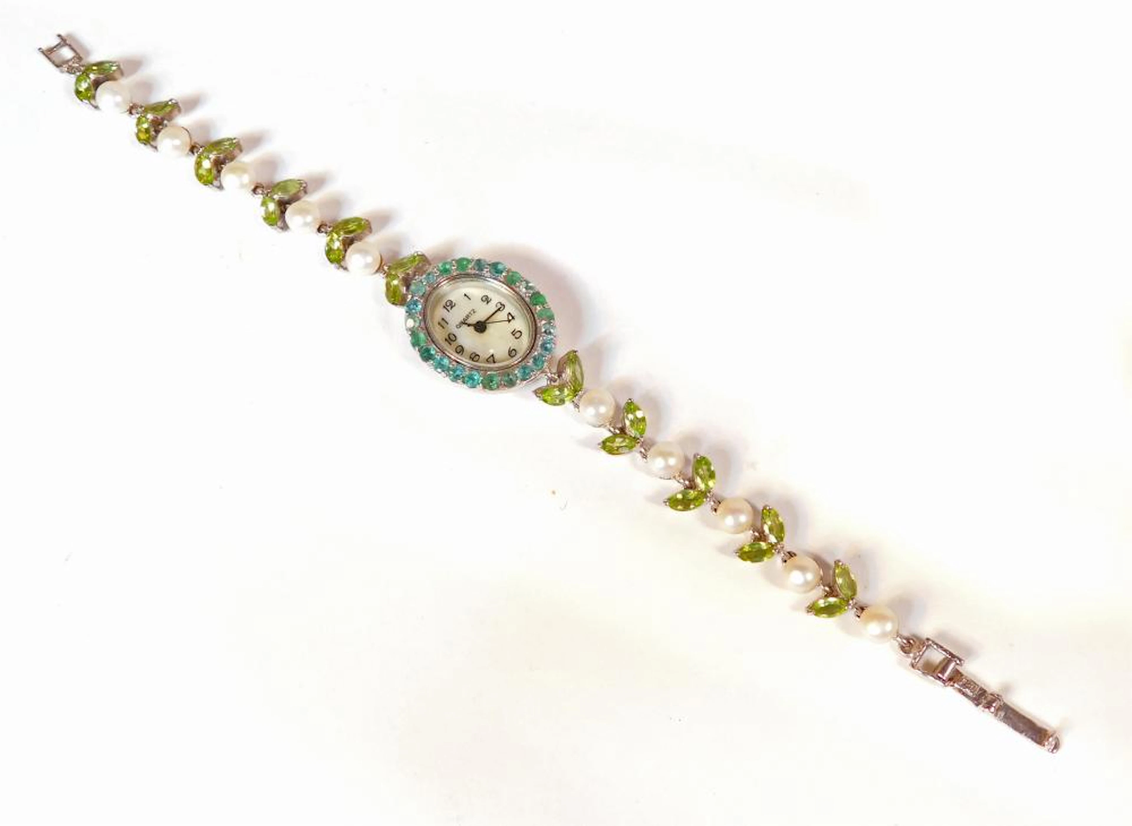RELOJ JOYA CON ESFERA DE ESMERALDAS Y EL ARMIS DE PERLAS...