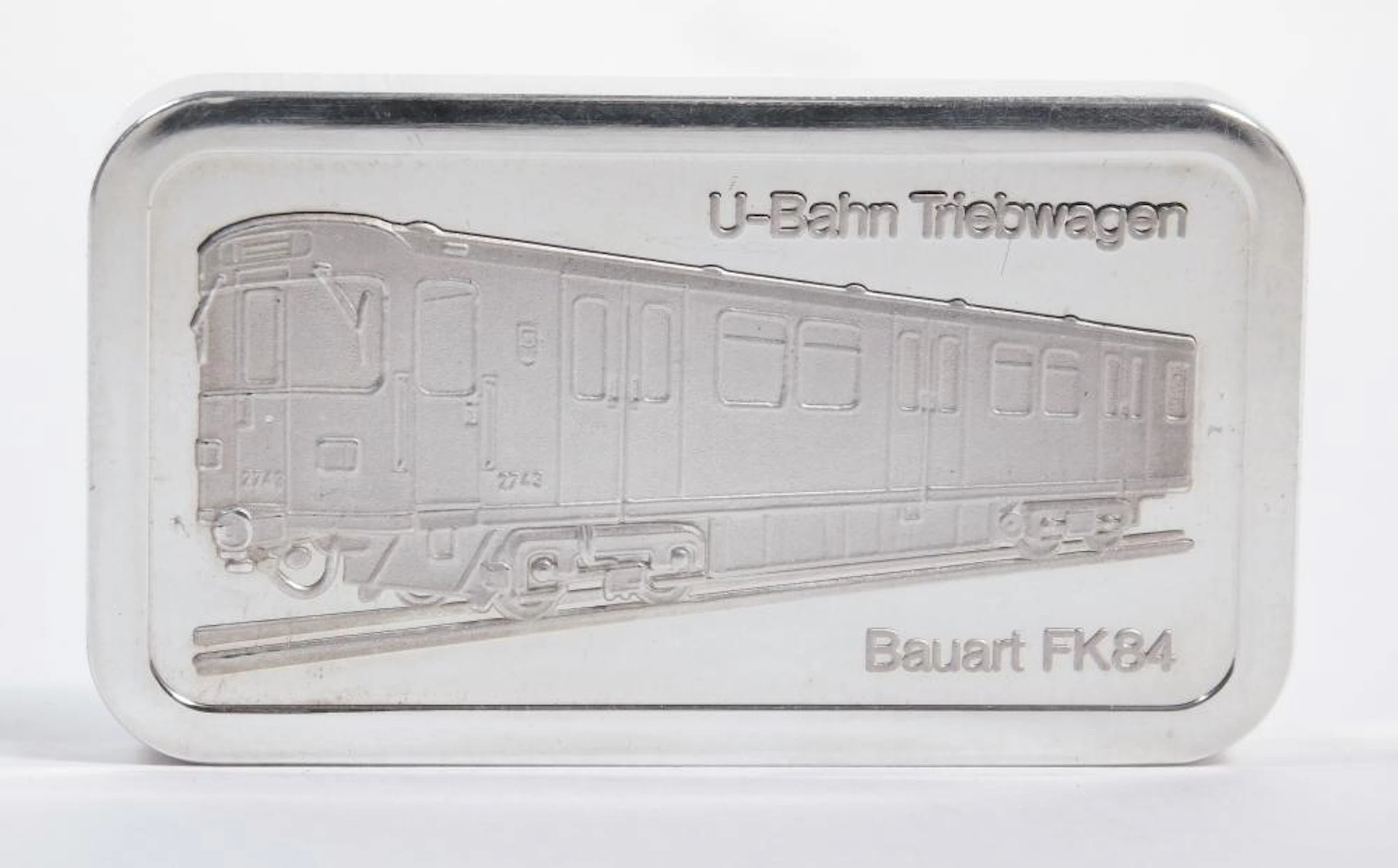 LINGOTE CON DETALLE DE FERROCARRIL de plata Feinsilber 999. Peso: 50 gr.