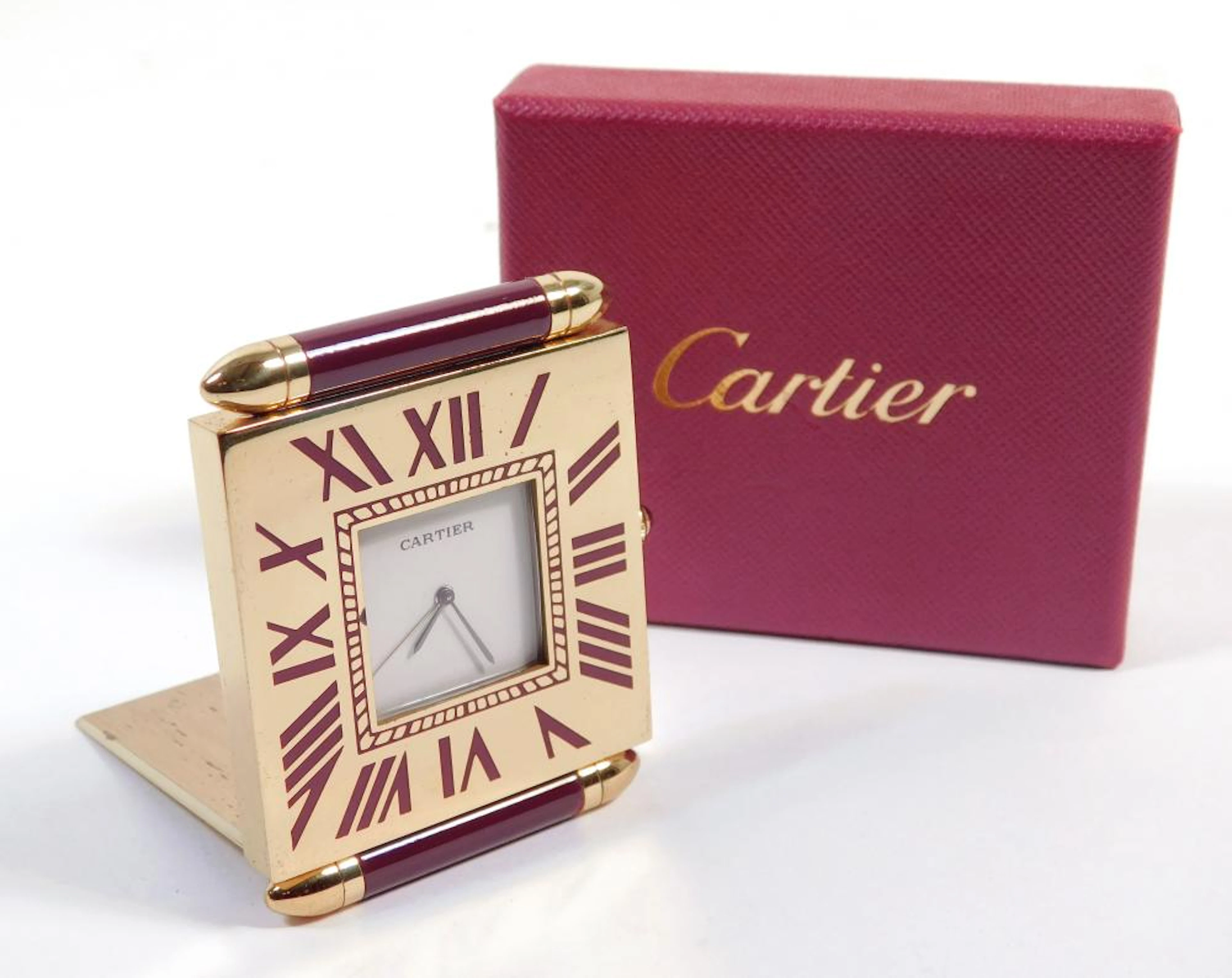 CARTIER. RELOJ DE VIAJE en plaqué de oro amarillo con...