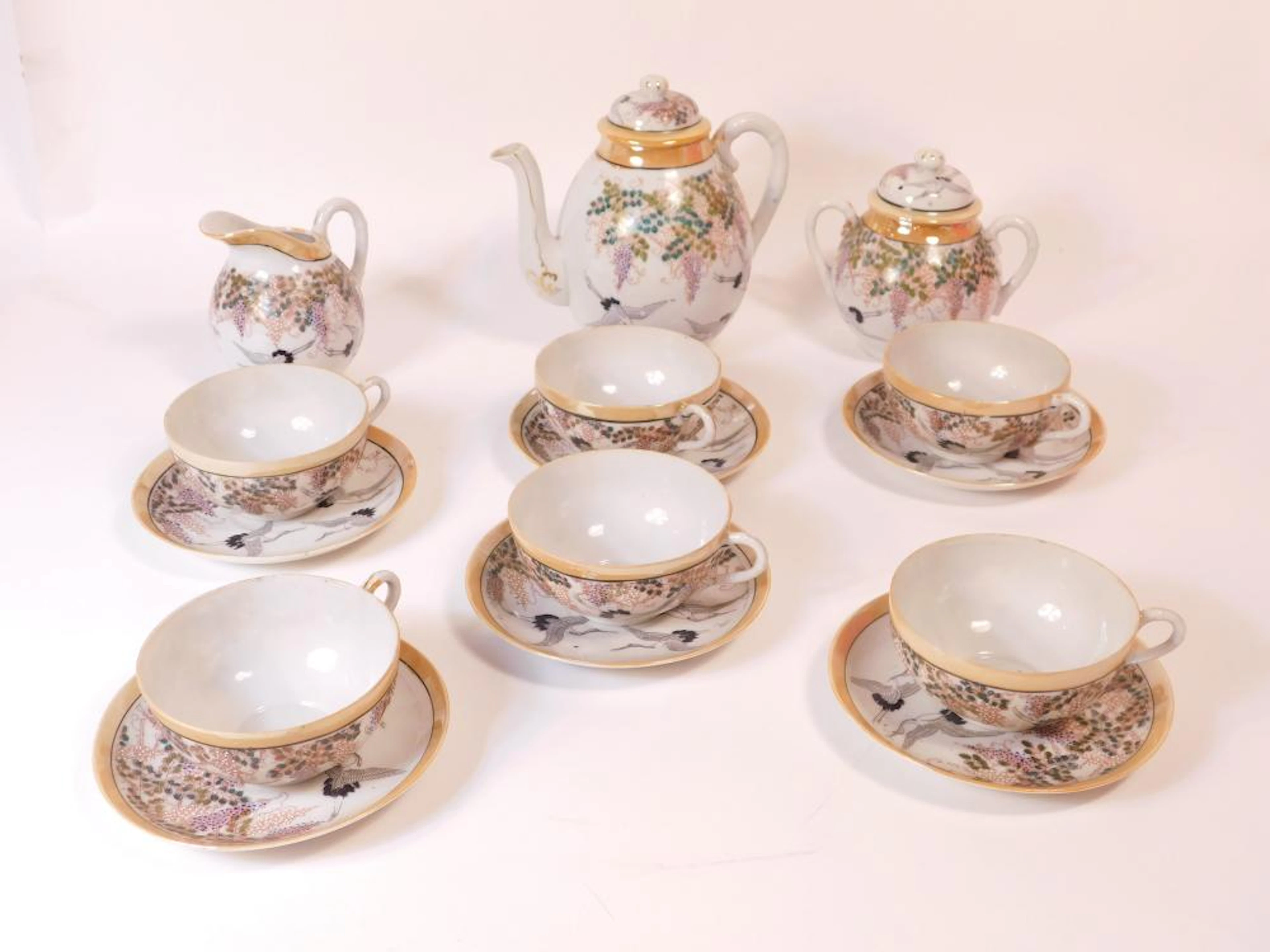 JUEGO DE TÉ en fina porcelana japonesa con motivos de...