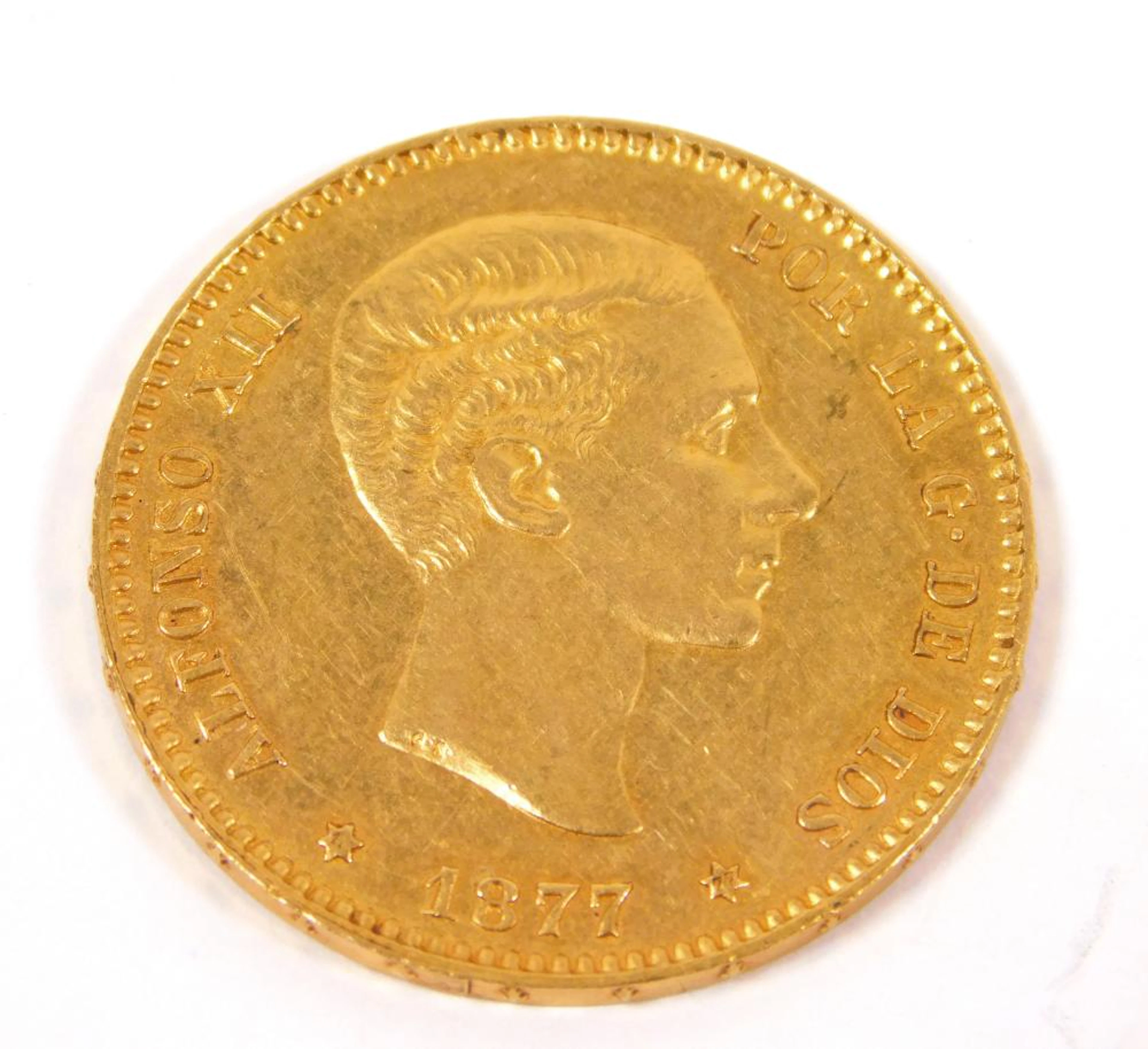 MONEDA ALFONSO XII DE 25 PESETASfE en oro amarillo Fechada 1877.