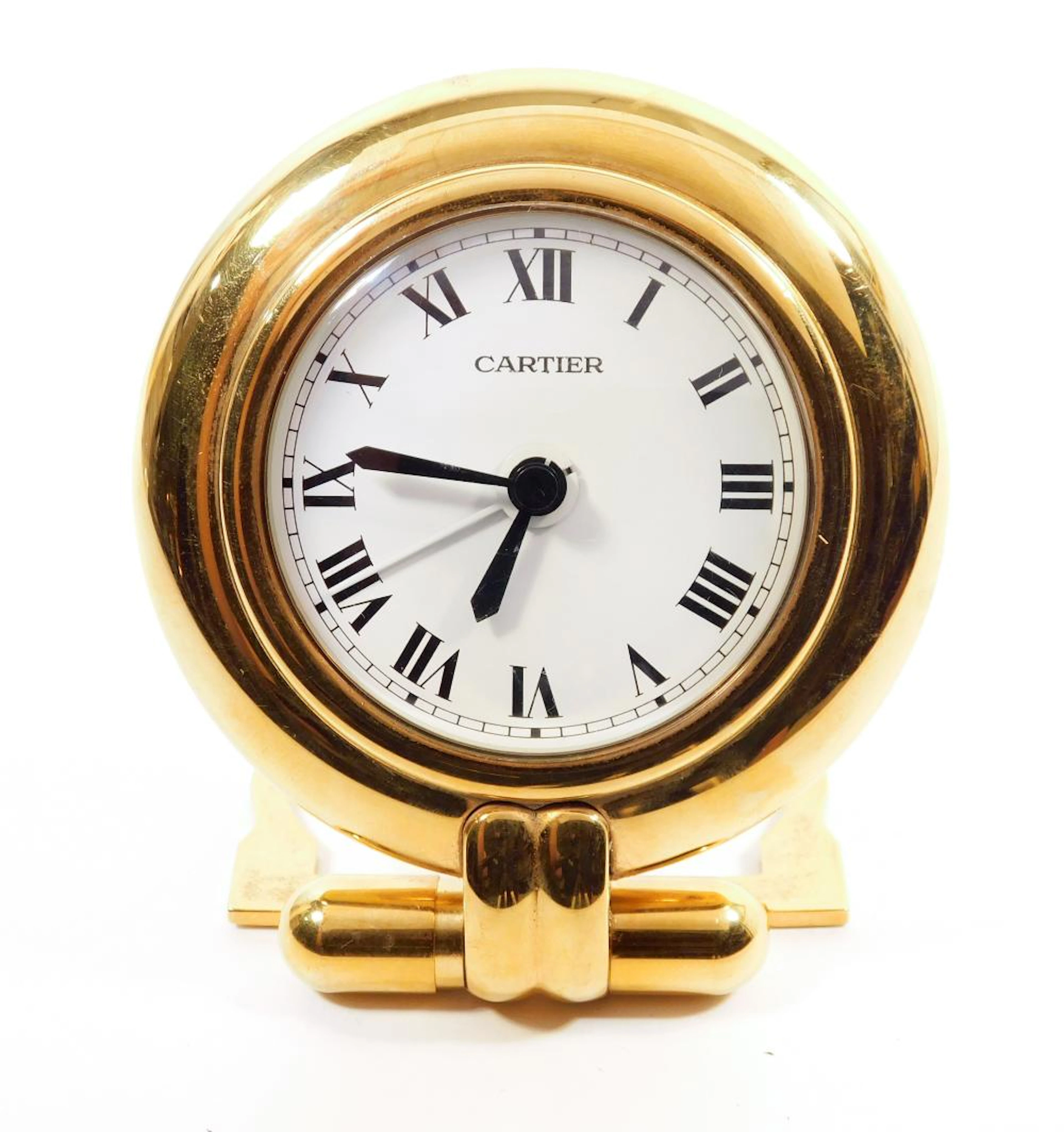 CARTIER. RELOJ DESPERTADOR DE SOBREMESA en plaqué de oro...