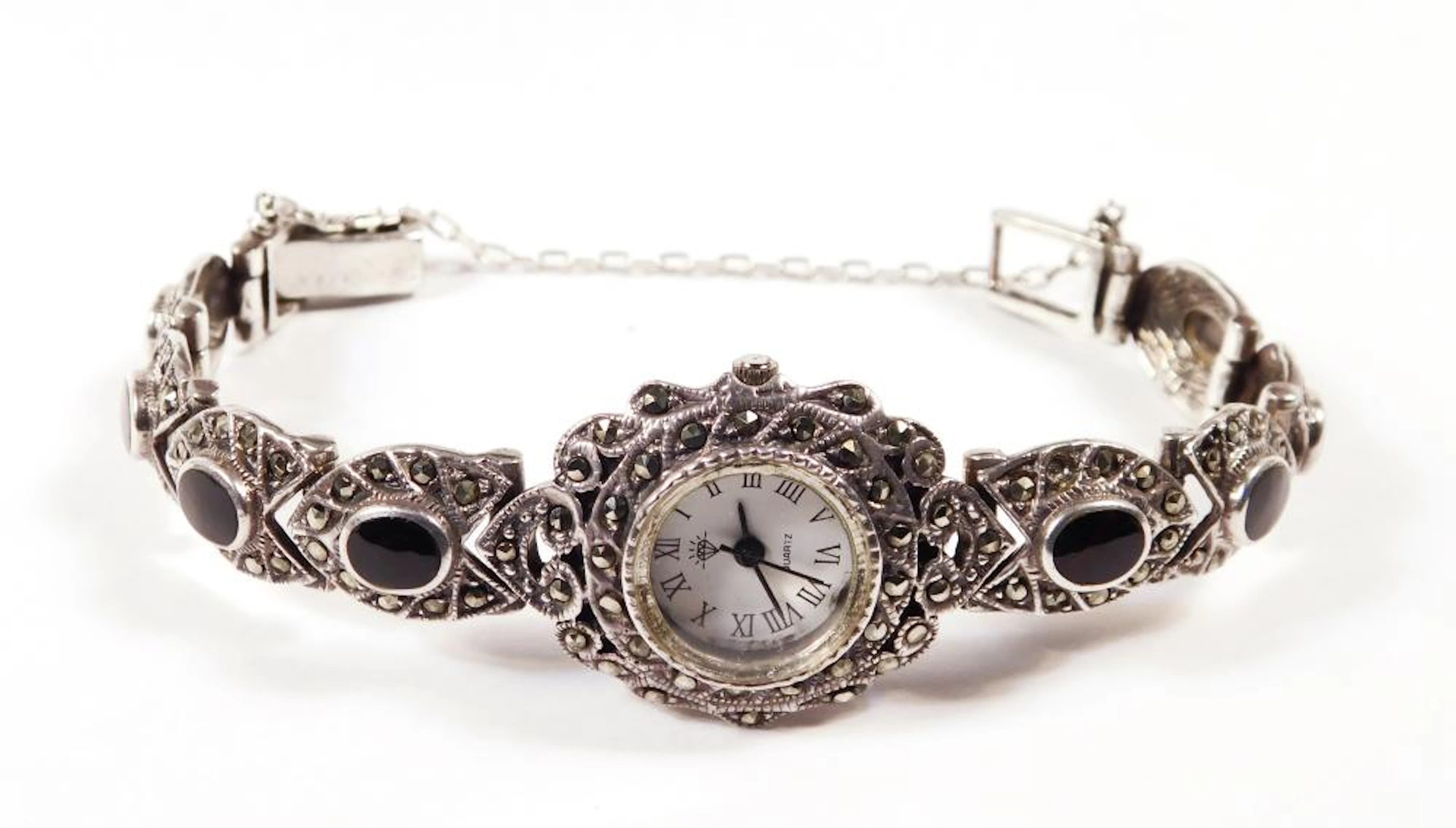 RELOJ DE PULSERA TIPO JOYA  en plata con circonitas y esmaltes en negro