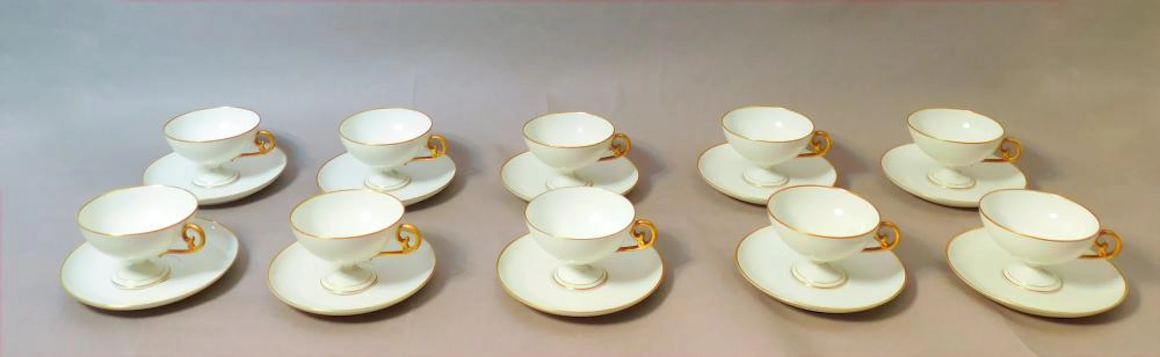 JUEGO DE 10 TAZAS DE CAFÉ en porcelana de limoges con ribete dorado